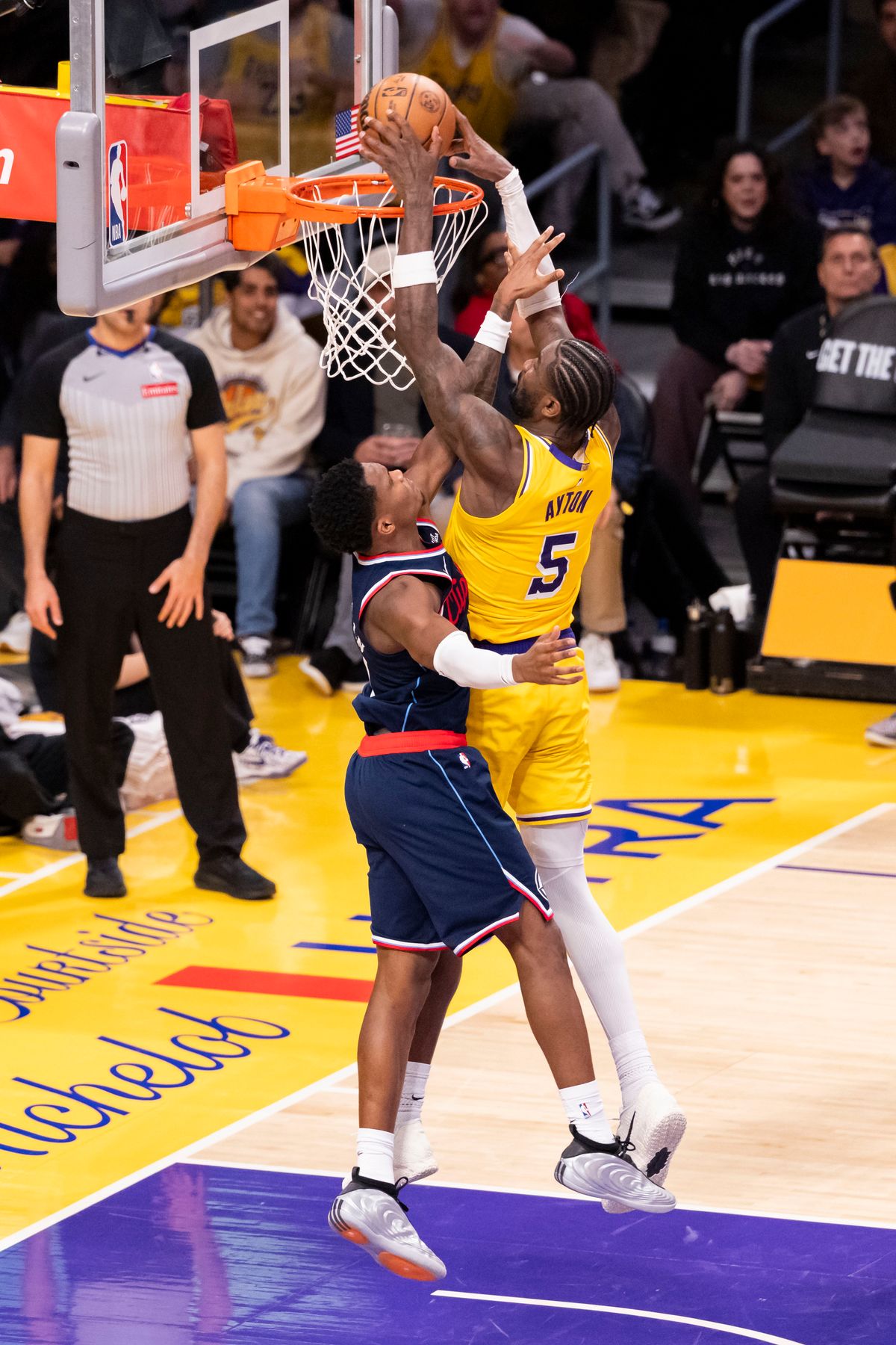 Deandre Ayton #5 of the Los Angeles Lakers attempts a dunk over Bennedict Mathurin #9 of the LA Clippers during an NBA basketball game, Friday February 20, 2026 in Los Angeles, Calif.