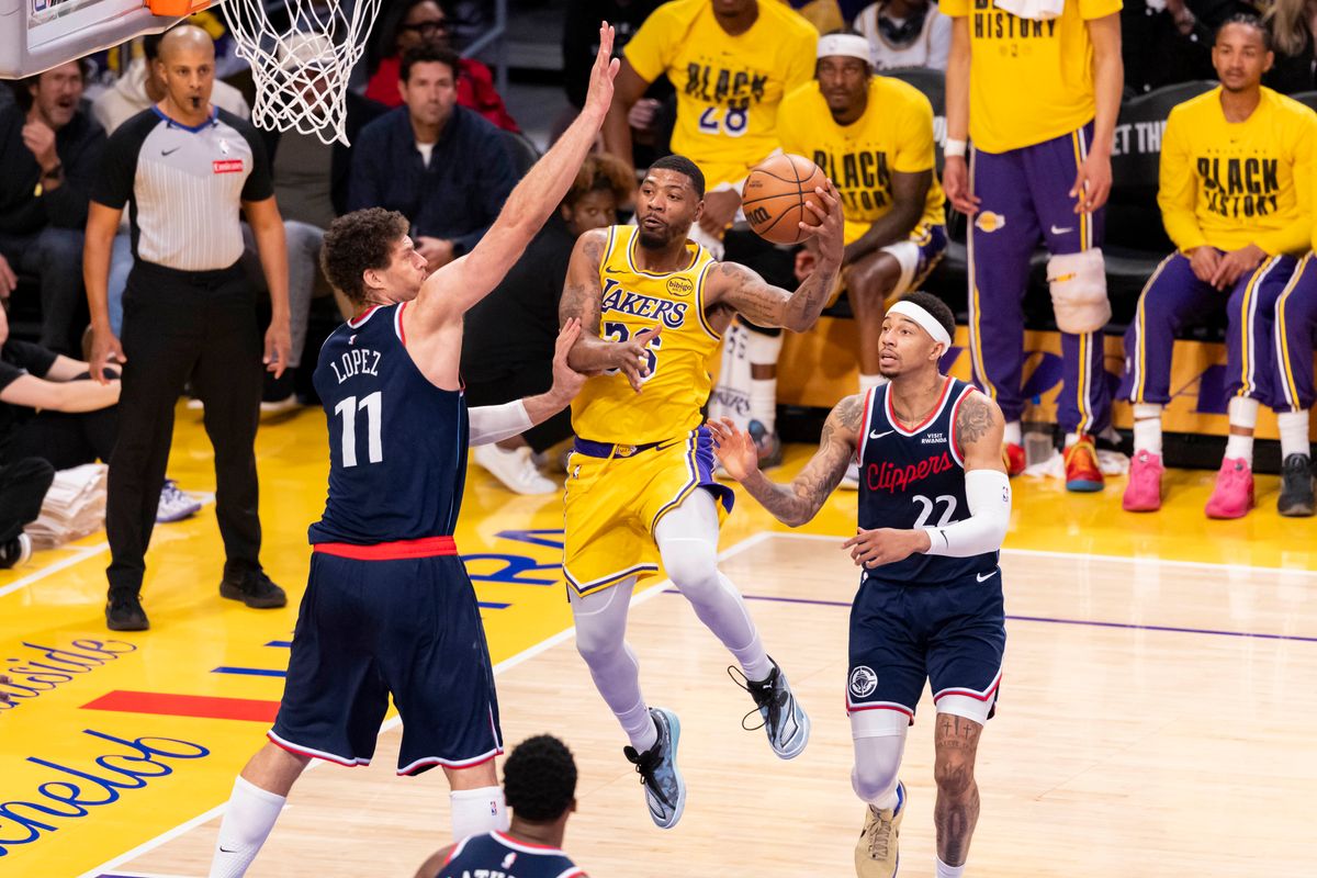 Marcus Smart #36 of the Los Angeles Lakers jumps with the ball during an NBA basketball game against the LA Clippers, Friday February 20, 2026 in Los Angeles, Calif.