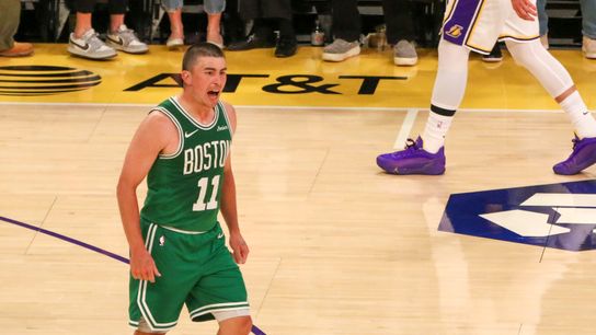 Boston Celtics guard Payton Prichard (11) celebrates hitting a 3-pointer before the half at crypto.com Arena.