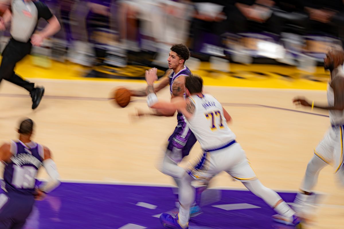 Sacramento Kings guard Nique Clifford (5) running past Luka Doncic during an NBA basketball game against the Los Angeles Lakers on March 1st, 2026 in Los Angeles, CA. Sacramento Kings guard Nique Clifford (5) running past Luka Doncic during an NBA basketball game against the Los Angeles Lakers on March 1st, 2026 in Los Angeles, CA.