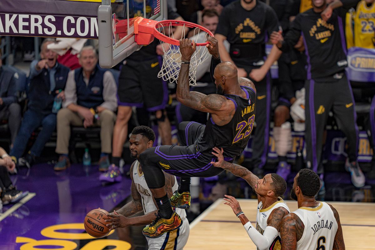 Los Angeles Lakers forward LeBron James (23) dunking the basketball and hanging on the rim during an NBA basketball game against the New Orleans Pelicans on March 3rd, 2026 in Los Angeles, CA. Los Angeles Lakers forward LeBron James (23) dunking the basketball and hanging on the rim during an NBA basketball game against the New Orleans Pelicans on March 3rd, 2026 in Los Angeles, CA.