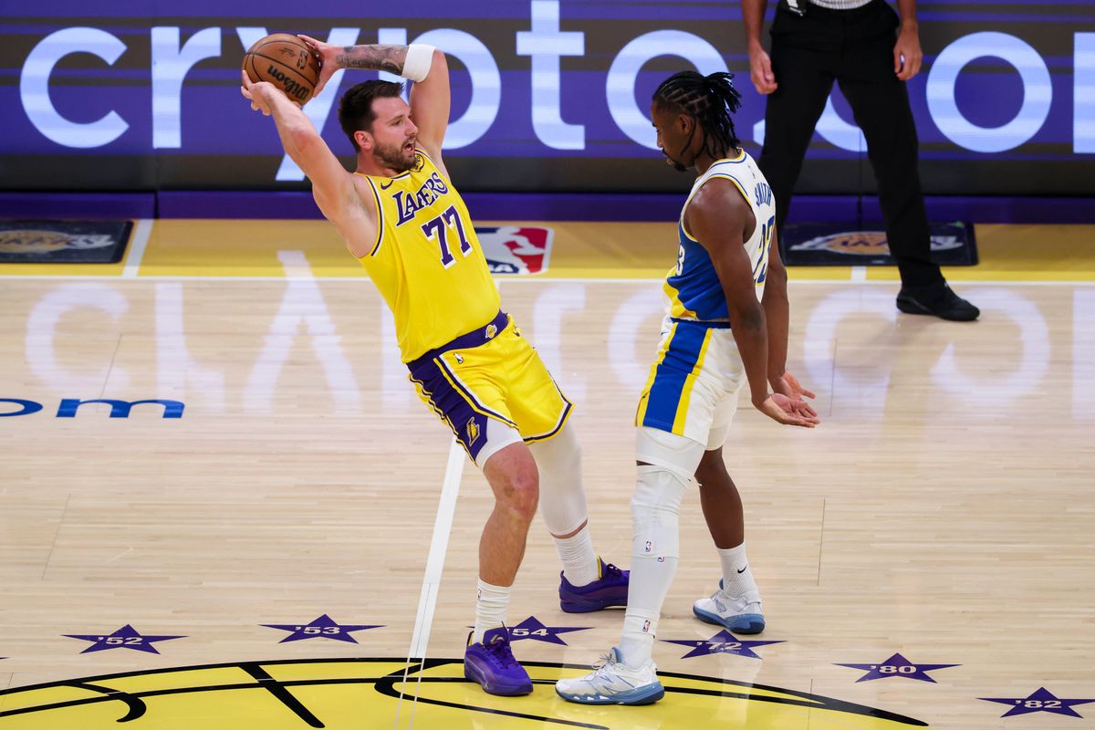 Luka Dončić #77 of the Los Angeles Lakers tries to avoid the backcourt violation as Aaron Nesmith #23 of the Indiana Pacers defends during an NBA basketball game, Friday March 6, 2026 in Los Angeles, Calif. Luka Dončić #77 of the Los Angeles Lakers tries to avoid the backcourt violation as Aaron Nesmith #23 of the Indiana Pacers defends during an NBA basketball game, Friday March 6, 2026 in Los Angeles, Calif.
