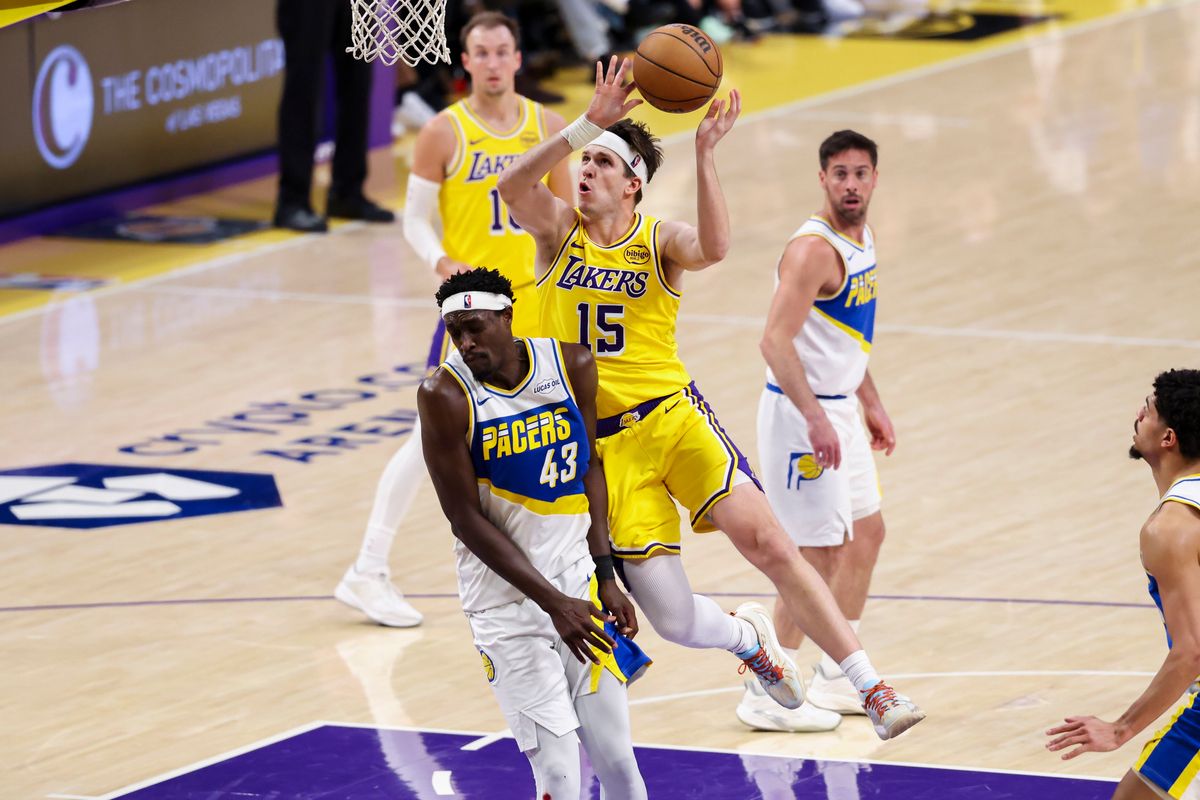 Austin Reaves #15 of the Los Angeles Lakers collides with Pascal Siakam #43 of the Indiana Pacers as he drives towards the basket during an NBA basketball game, Friday March 6, 2026 in Los Angeles, Calif. Austin Reaves #15 of the Los Angeles Lakers collides with Pascal Siakam #43 of the Indiana Pacers as he drives towards the basket during an NBA basketball game, Friday March 6, 2026 in Los Angeles, Calif.