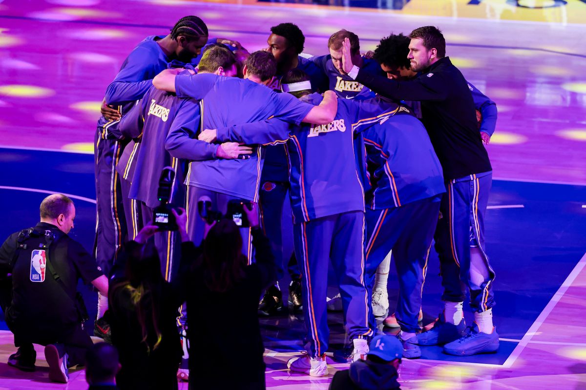 Luka Doncic #77 slaps Austin Reaves #15 of the Los Angeles Lakers on the head during the pregame huddle before an NBA basketball game against the Brooklyn Nets, Friday March 27, 2026 in Los Angeles, Calif. Luka Doncic #77 slaps Austin Reaves #15 of the Los Angeles Lakers on the head during the pregame huddle before an NBA basketball game against the Brooklyn Nets, Friday March 27, 2026 in Los Angeles, Calif.