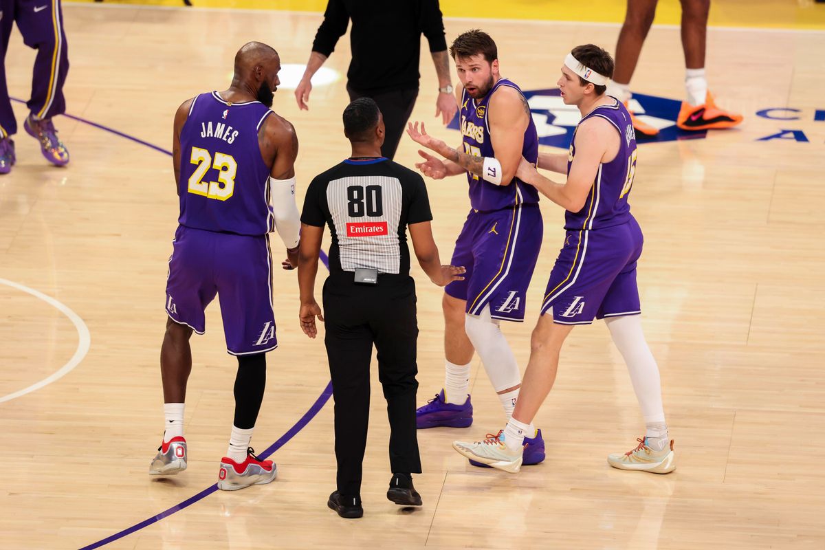 LeBron James #23, Luka Doncic #77, and Austin Reaves #15 of the Los Angeles Lakers plead their case to referee JD Ralls during an NBA basketball game against the Brooklyn Nets, Friday March 27, 2026 in Los Angeles, Calif. LeBron James #23, Luka Doncic #77, and Austin Reaves #15 of the Los Angeles Lakers plead their case to referee JD Ralls during an NBA basketball game against the Brooklyn Nets, Friday March 27, 2026 in Los Angeles, Calif.