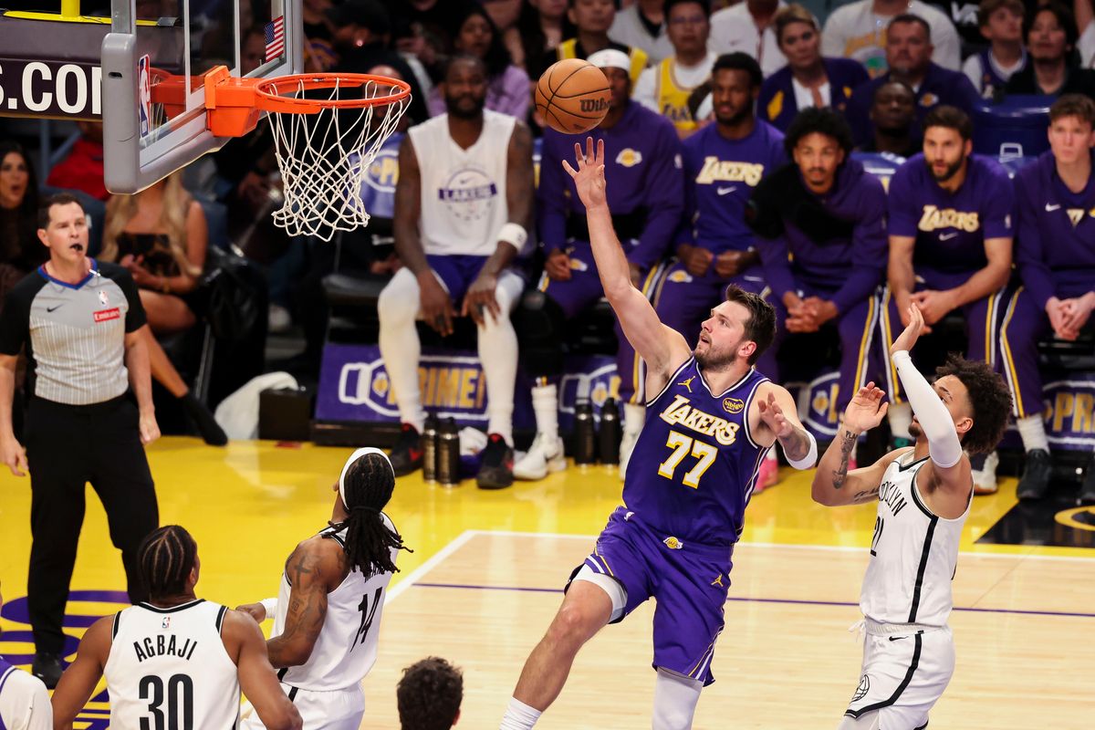 Luka Doncic #77 of the Los Angeles Lakers lays the ball up during an NBA basketball game against the Brooklyn Nets, Friday March 27, 2026 in Los Angeles, Calif. Luka Doncic #77 of the Los Angeles Lakers lays the ball up during an NBA basketball game against the Brooklyn Nets, Friday March 27, 2026 in Los Angeles, Calif.