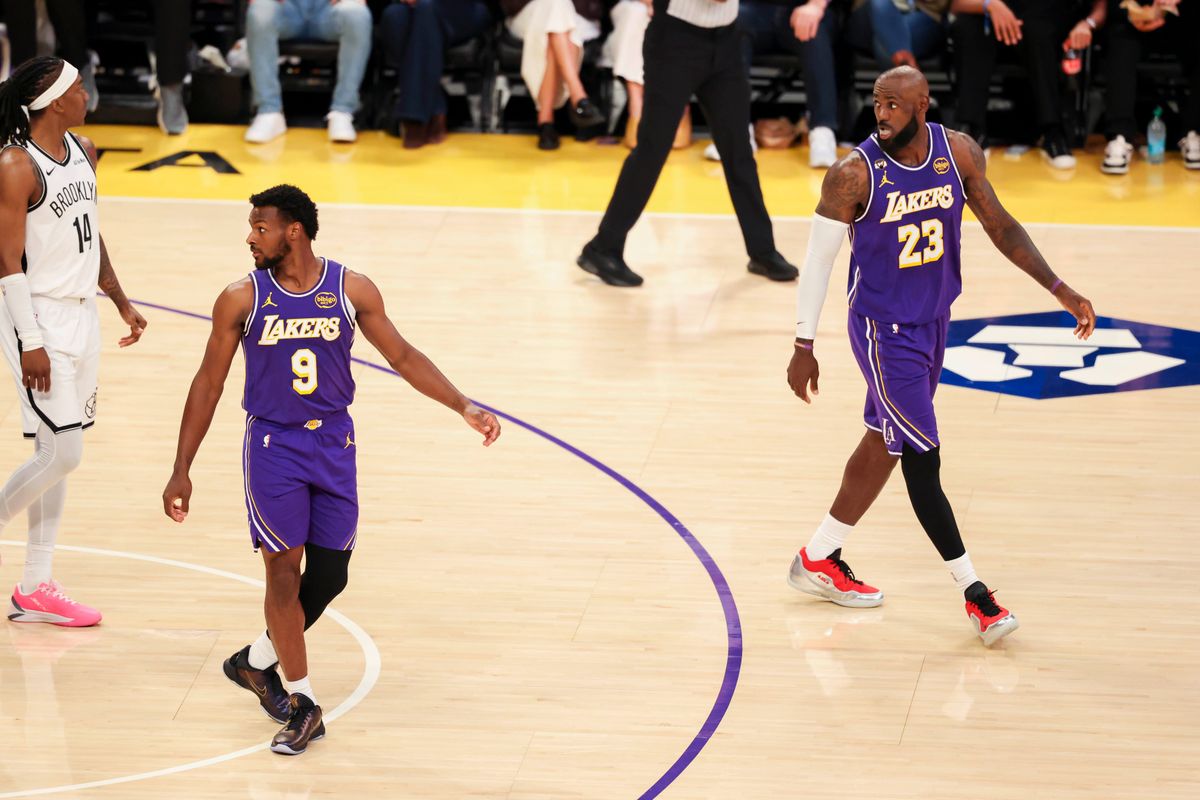 Bronny James #9 and LeBron James #23 of the Los Angeles Lakers on the court together during an NBA basketball game against the Brooklyn Nets, Friday March 27, 2026 in Los Angeles, Calif. Bronny James #9 and LeBron James #23 of the Los Angeles Lakers on the court together during an NBA basketball game against the Brooklyn Nets, Friday March 27, 2026 in Los Angeles, Calif.