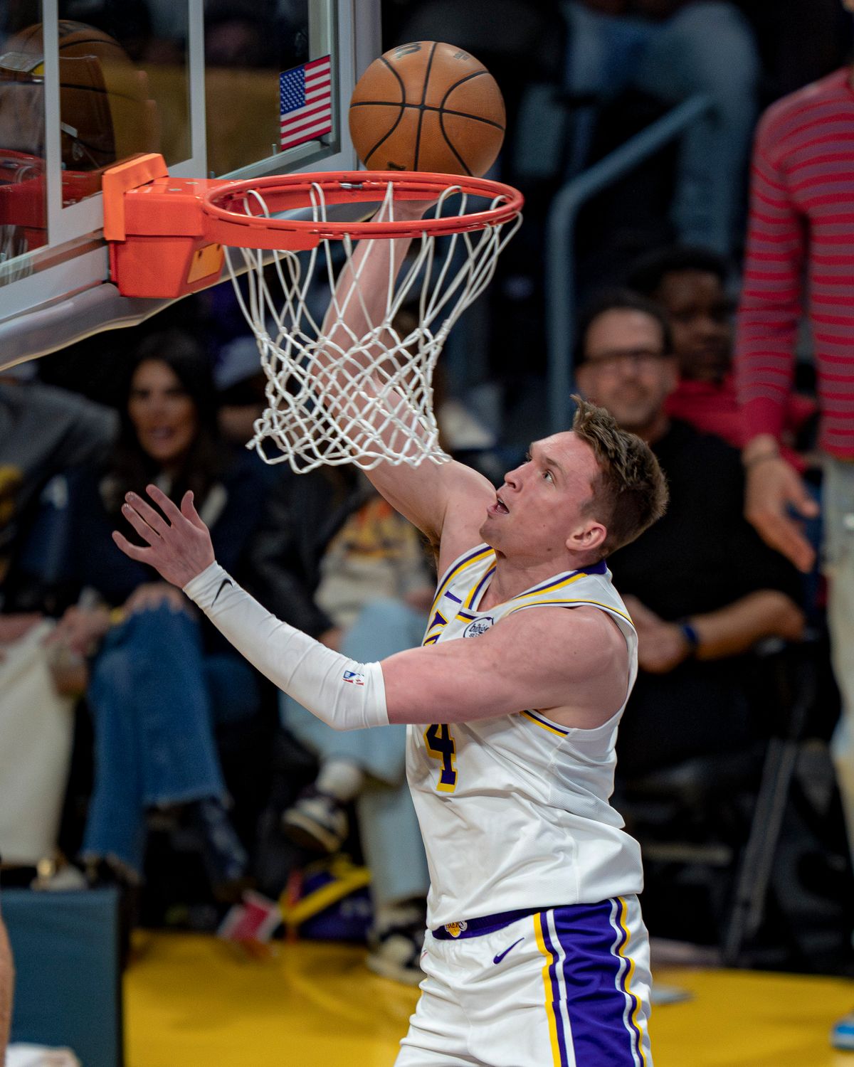 Los Angeles Lakers guard Dalton Knecht (4) dunking during an NBA basketball game against the Utah Jazz on April 12th, 2026 in Los Angeles, CA. Los Angeles Lakers guard Dalton Knecht (4) dunking during an NBA basketball game against the Utah Jazz on April 12th, 2026 in Los Angeles, CA.