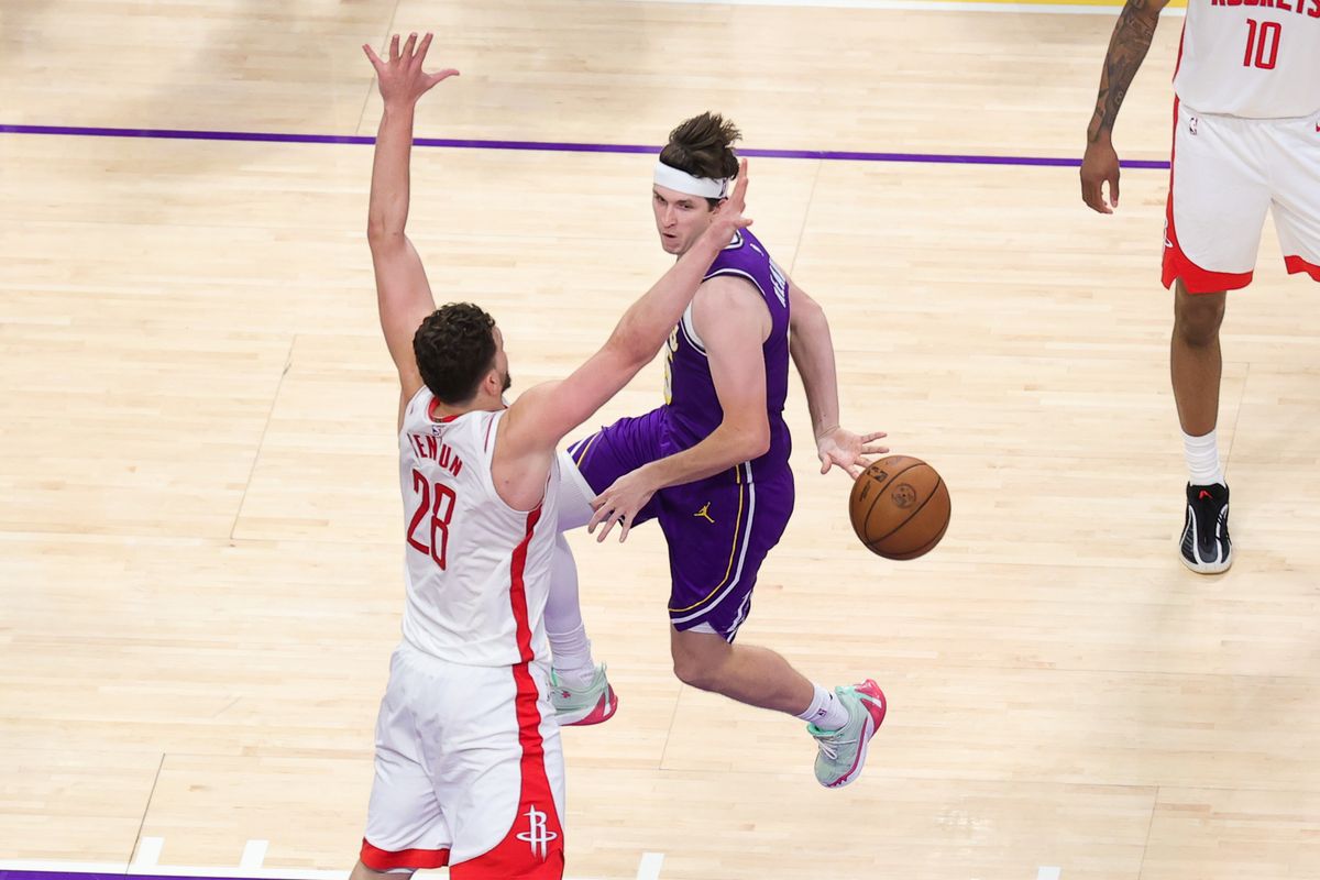 Los Angeles Lakers guard Austin Reaves (15) passes the basketball during an NBA playoffs game against the Houston Rockets on April 29, 2026 in Los Angeles, CA. Los Angeles Lakers guard Austin Reaves (15) passes the basketball during an NBA playoffs game against the Houston Rockets on April 29, 2026 in Los Angeles, CA.
