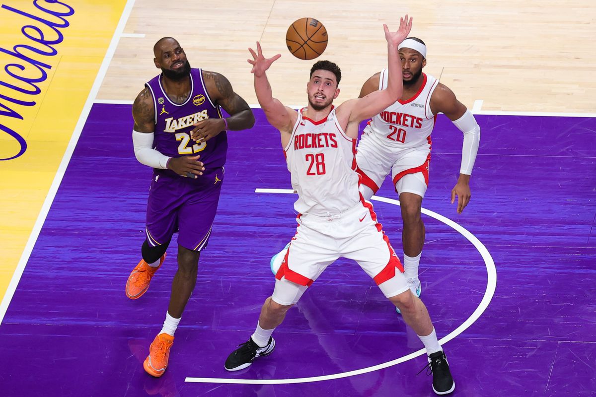 Los Angeles Lakers forward LeBron James (23) and Houston Rockets center Alperen Sengun (28) attempt to secure the loose ball during an NBA playoffs game on April 29, 2026 in Los Angeles, CA. Los Angeles Lakers forward LeBron James (23) and Houston Rockets center Alperen Sengun (28) attempt to secure the loose ball during an NBA playoffs game on April 29, 2026 in Los Angeles, CA.