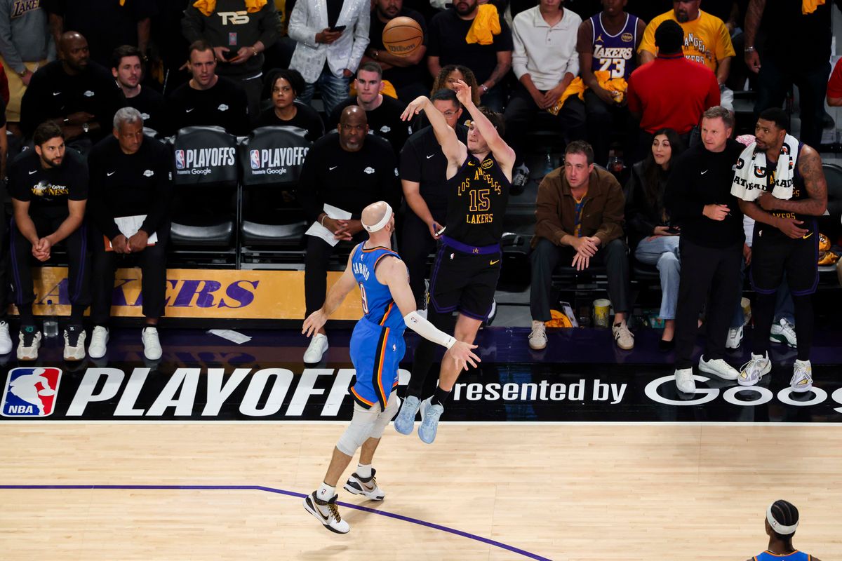 Austin Reaves #15 of the Los Angeles Lakers shoots a three pointer over Alex Caruso #9 of the Oklahoma City Thunder during an NBA Playoffs basketball game, Monday May 11, 2026 in Los Angeles, Calif. Austin Reaves #15 of the Los Angeles Lakers shoots a three pointer over Alex Caruso #9 of the Oklahoma City Thunder during an NBA Playoffs basketball game, Monday May 11, 2026 in Los Angeles, Calif.