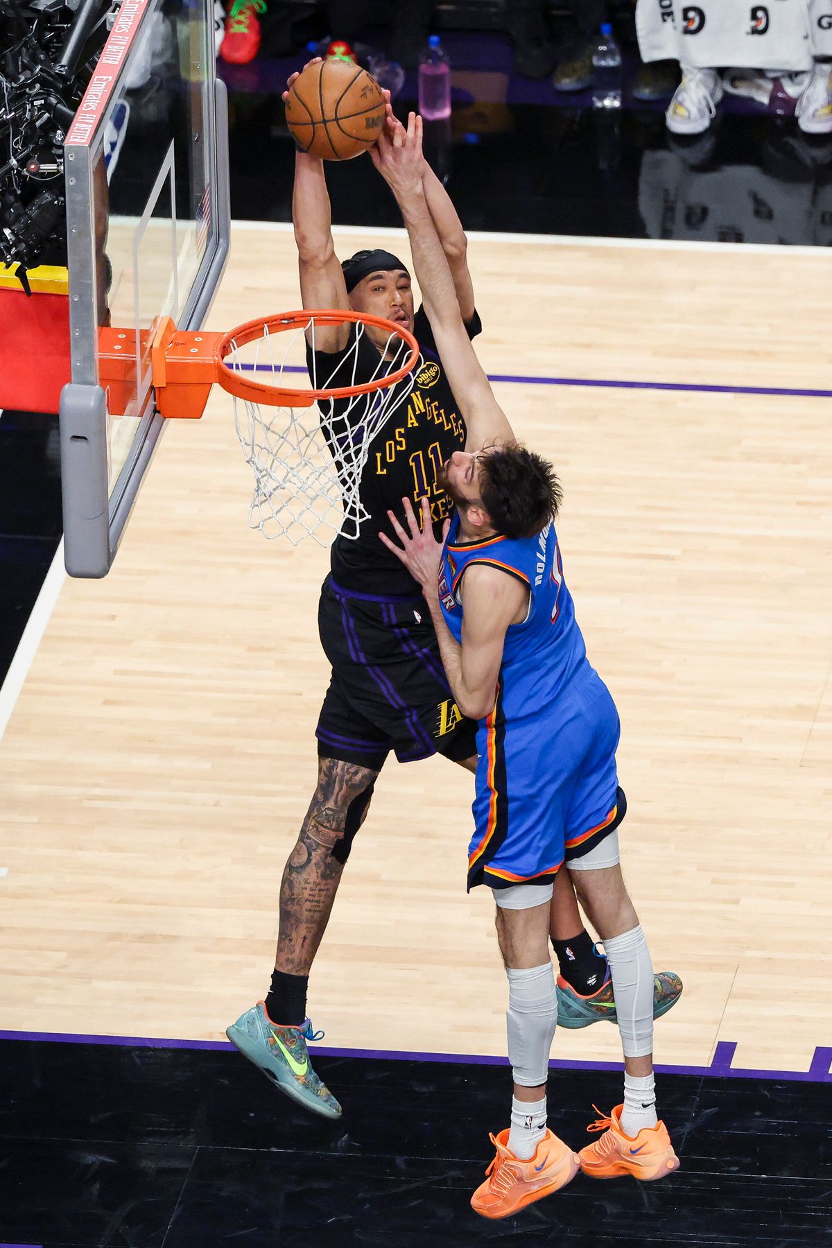 Jaxson Hayes #11 of the Los Angeles Lakers dunks the ball over Chet Holmgren #7 of the Oklahoma City Thunder during an NBA Playoffs basketball game, Monday May 11, 2026 in Los Angeles, Calif. Jaxson Hayes #11 of the Los Angeles Lakers dunks the ball over Chet Holmgren #7 of the Oklahoma City Thunder during an NBA Playoffs basketball game, Monday May 11, 2026 in Los Angeles, Calif.