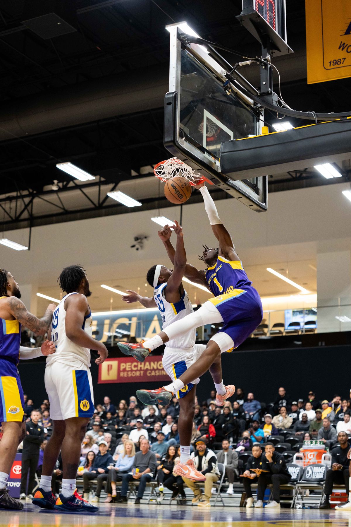 South Bay Lakers forward Adou Theiro (1) dunks the ball during an NBA G League basketball game against the Santa Cruz Warriors on Friday, Nov. 21, 2025, in El Segundo, Calif. South Bay Lakers forward Adou Theiro (1) dunks the ball during an NBA G League basketball game against the Santa Cruz Warriors on Friday, Nov. 21, 2025, in El Segundo, Calif.