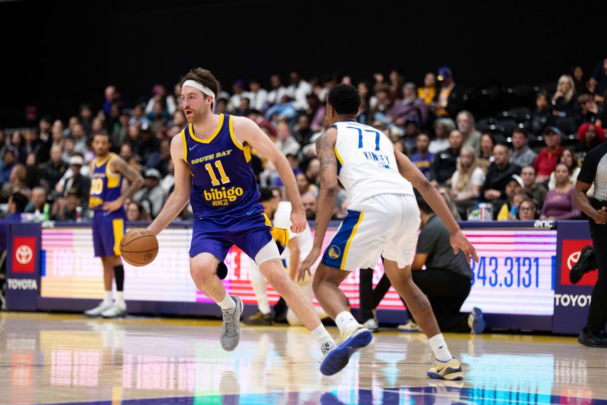 South Bay Lakers forward Drew Timme (11) dribbles against a defender during an NBA G League basketball game against the Santa Cruz Warriors on Friday, Nov. 21, 2025, in El Segundo, Calif. South Bay Lakers forward Drew Timme (11) dribbles against a defender during an NBA G League basketball game against the Santa Cruz Warriors on Friday, Nov. 21, 2025, in El Segundo, Calif.