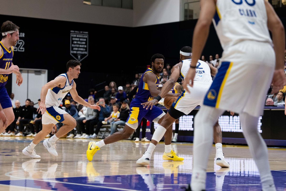 South Bay Lakers guard Bronny James Jr. (9) dribbles against a defender during an NBA G League basketball game against the Santa Cruz Warriors on Friday, Nov. 21, 2025, in El Segundo, Calif. South Bay Lakers guard Bronny James Jr. (9) dribbles against a defender during an NBA G League basketball game against the Santa Cruz Warriors on Friday, Nov. 21, 2025, in El Segundo, Calif.