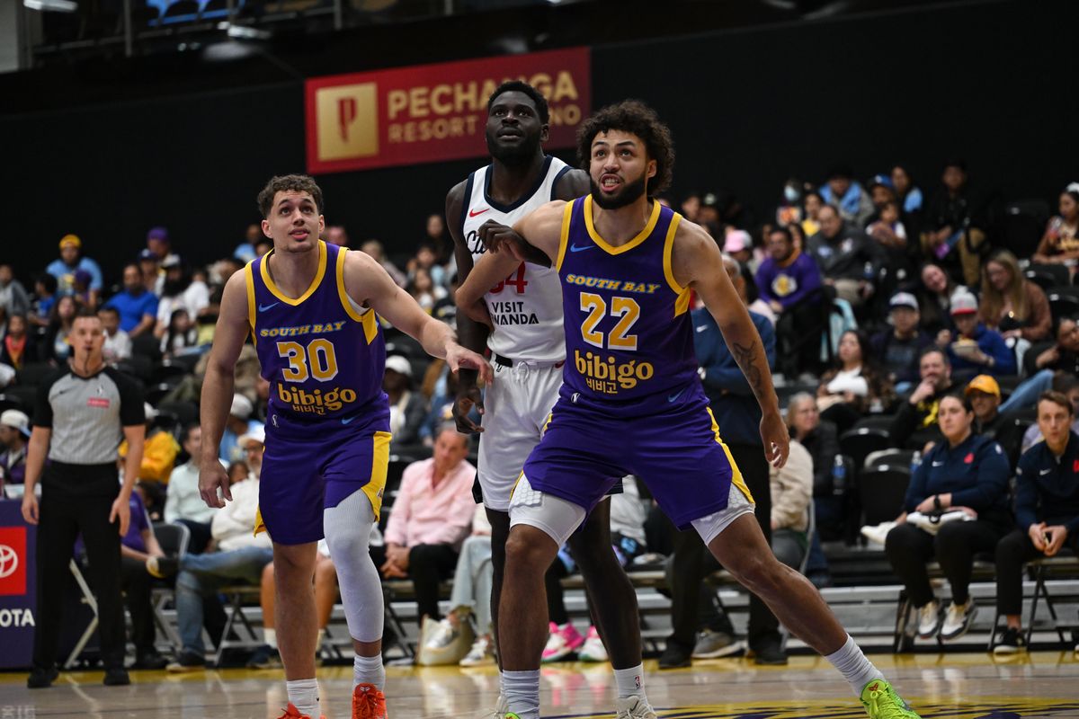 South Bay Lakers Forward Anton Watson (22) and Center Kylor Kelley (33) box out for a rebound during a G-League basketball game between the South Bay Lakers and San Diego Clippers Wednesday, January 14, 2026 at UCLA Health Training Center in El Segundo, Calif. South Bay Lakers Forward Anton Watson (22) and Center Kylor Kelley (33) box out for a rebound during a G-League basketball game between the South Bay Lakers and San Diego Clippers Wednesday, January 14, 2026 at UCLA Health Training Center in El Segundo, Calif.