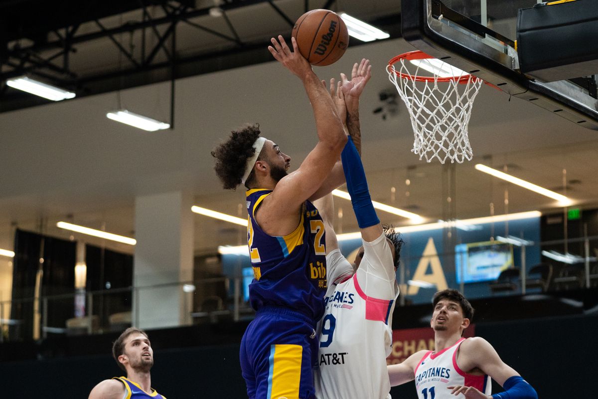 South Bay Lakers Forward Anton Watson (22) attacks the rim and scores on his defender during a G-League basketball game against Mexico City Capitanes Thursday, January 22, 2026 at UCLA Health Training Center in El Segundo, Calif. South Bay Lakers Forward Anton Watson (22) attacks the rim and scores on his defender during a G-League basketball game against Mexico City Capitanes Thursday, January 22, 2026 at UCLA Health Training Center in El Segundo, Calif.