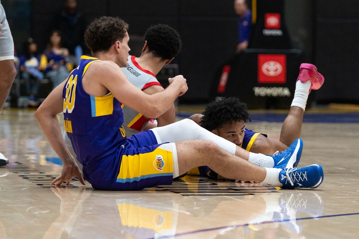 South Bay Lakers players dive on the floor for a loose ball during a G-League basketball game against College Park Skyhawks Tuesday, January 27, 2026 at UCLA Health Training Center in El Segundo, Calif. South Bay Lakers players dive on the floor for a loose ball during a G-League basketball game against College Park Skyhawks Tuesday, January 27, 2026 at UCLA Health Training Center in El Segundo, Calif.