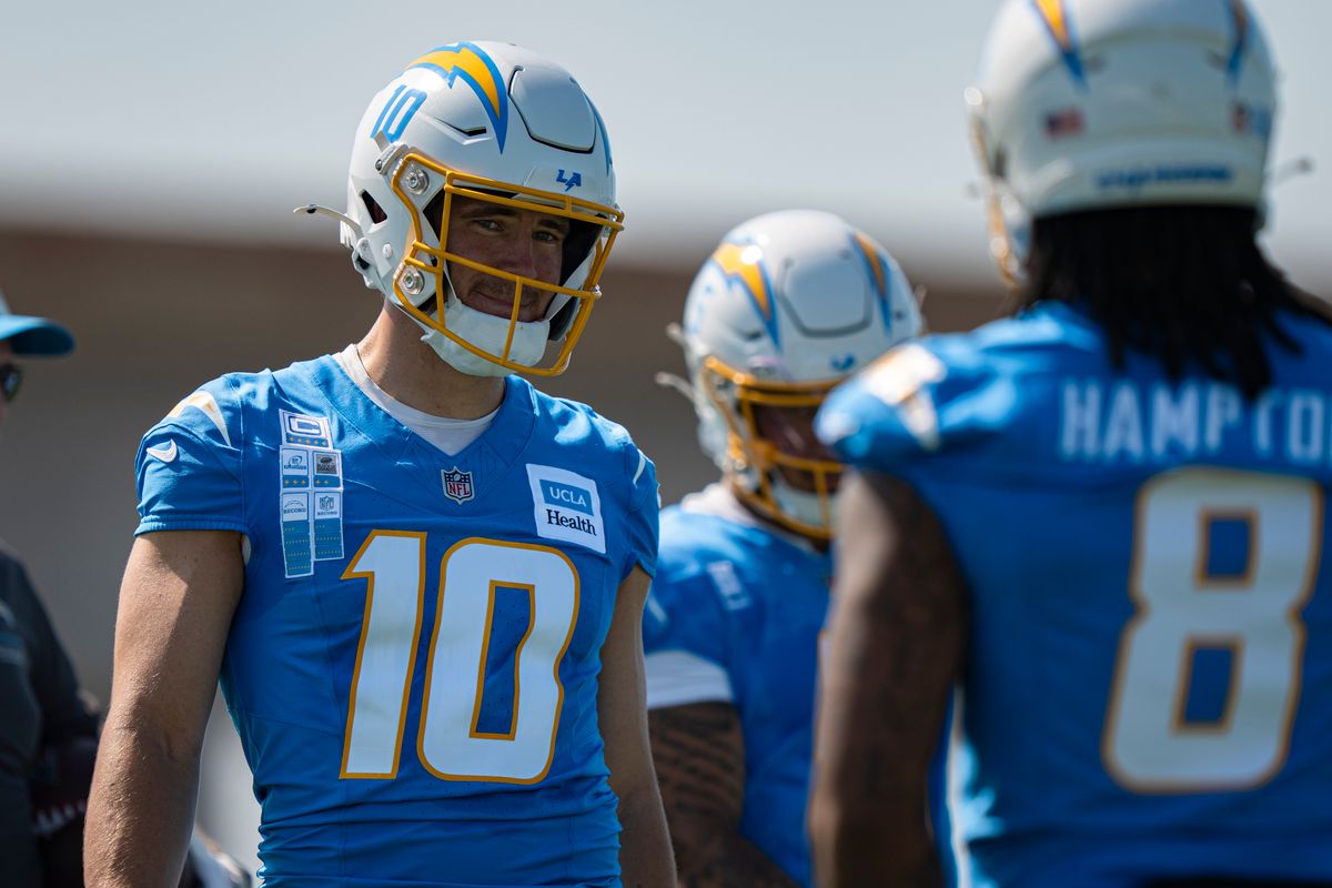 Los Angeles Chargers quarterback Justin Herbert (10) greeting running back Omarion Hampton (8) during Chargers training camp at the Bolt on Wednesday, July 29th in El Segundo, CA. Los Angeles Chargers quarterback Justin Herbert (10) greeting running back Omarion Hampton (8) during Chargers training camp at the Bolt on Wednesday, July 29th in El Segundo, CA.