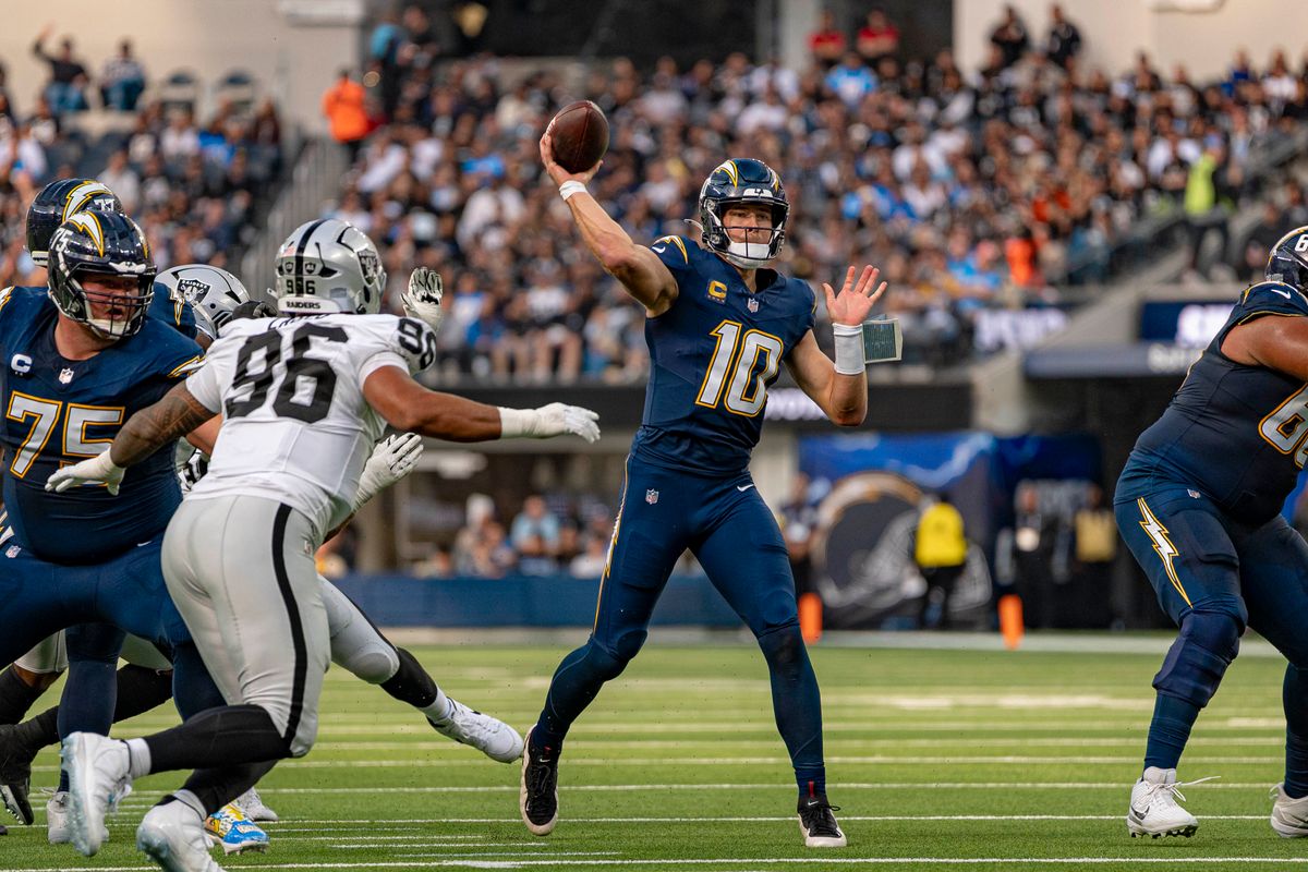 Los Angeles Chargers quarterback, Justin Herbert (10) passing during an NFL football game against the Las Vegas Raiders on November 30, 2025 in Los Angeles, CA. Los Angeles Chargers quarterback, Justin Herbert (10) passing during an NFL football game against the Las Vegas Raiders on November 30, 2025 in Los Angeles, CA.