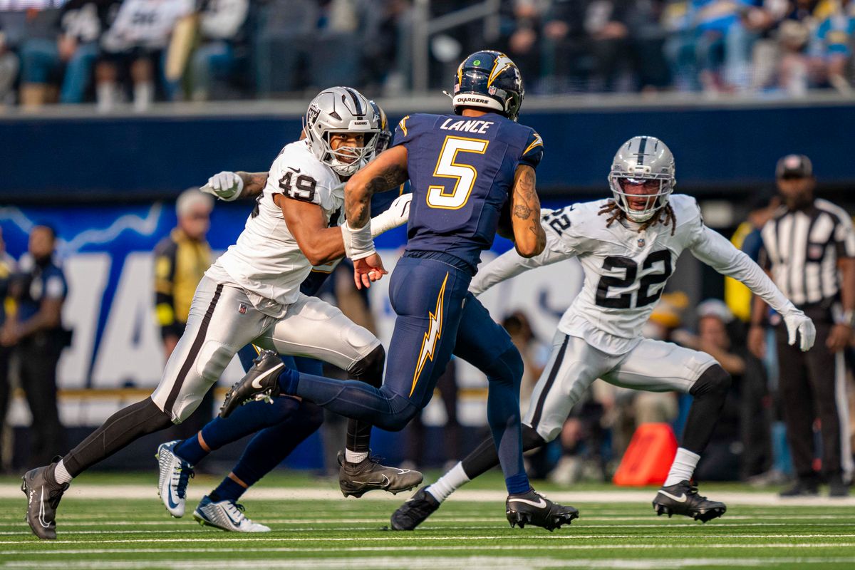 Los Angeles Chargers quarterback, Trey Lance (5) runs the football for a first down during an NFL football game against the Las Vegas Raiders on November 30, 2025 in Los Angeles, CA. Los Angeles Chargers quarterback, Trey Lance (5) runs the football for a first down during an NFL football game against the Las Vegas Raiders on November 30, 2025 in Los Angeles, CA.
