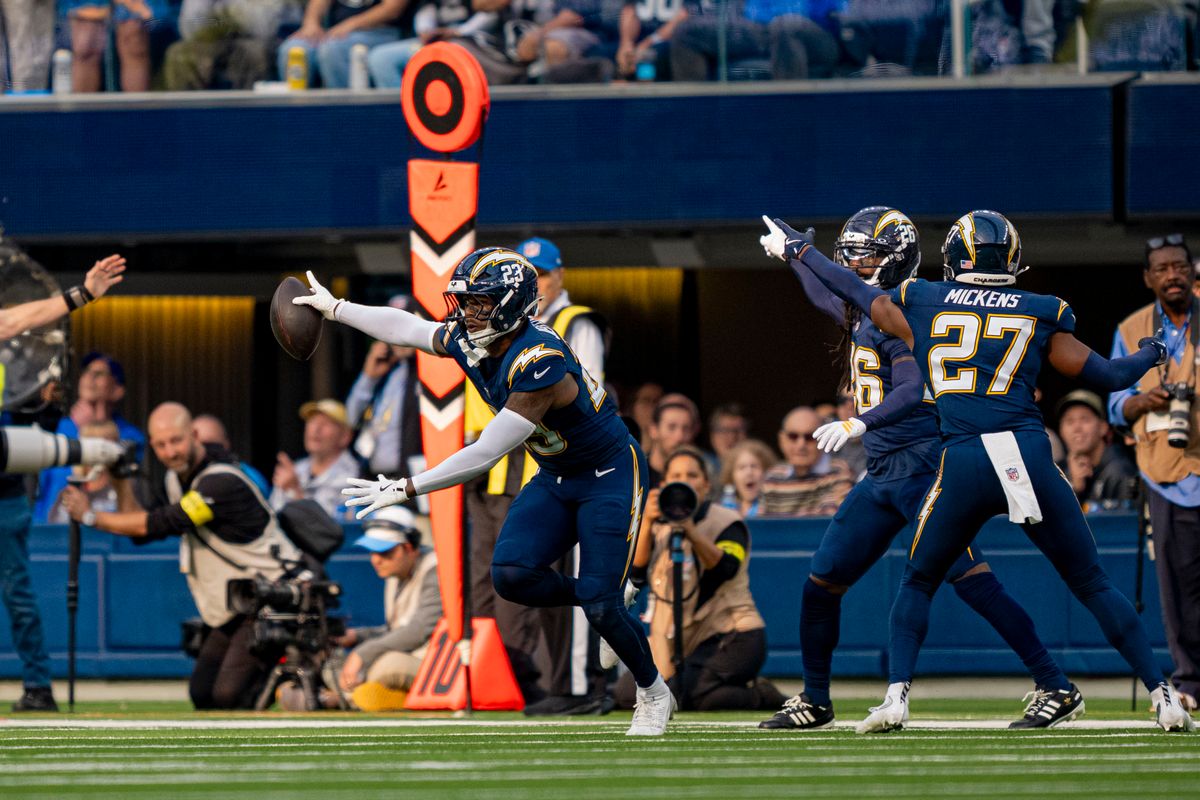 Los Angeles Chargers safety, Tony Jefferson (23) intercepts a pass broken up by Donte Jackson (26) during an NFL football game against the Las Vegas Raiders on November 30, 2025 in Los Angeles, CA. Los Angeles Chargers safety, Tony Jefferson (23) intercepts a pass broken up by Donte Jackson (26) during an NFL football game against the Las Vegas Raiders on November 30, 2025 in Los Angeles, CA.