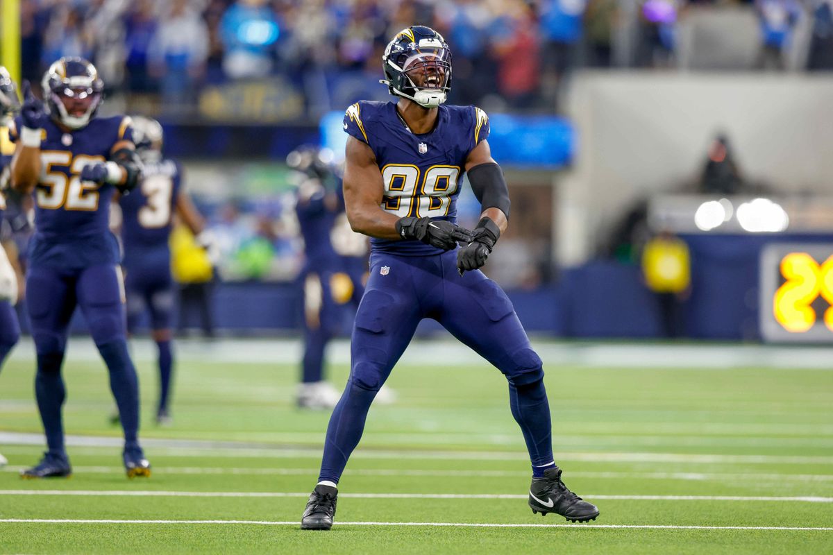 Los Angeles Chargers linebacker Odafe Oweh (98) celebrates after a sack during a NFL game against the Houston Texans on December 027, 2025 at Sofi Stadium in Inglewood, CA. Los Angeles Chargers linebacker Odafe Oweh (98) celebrates after a sack during a NFL game against the Houston Texans on December 027, 2025 at Sofi Stadium in Inglewood, CA.