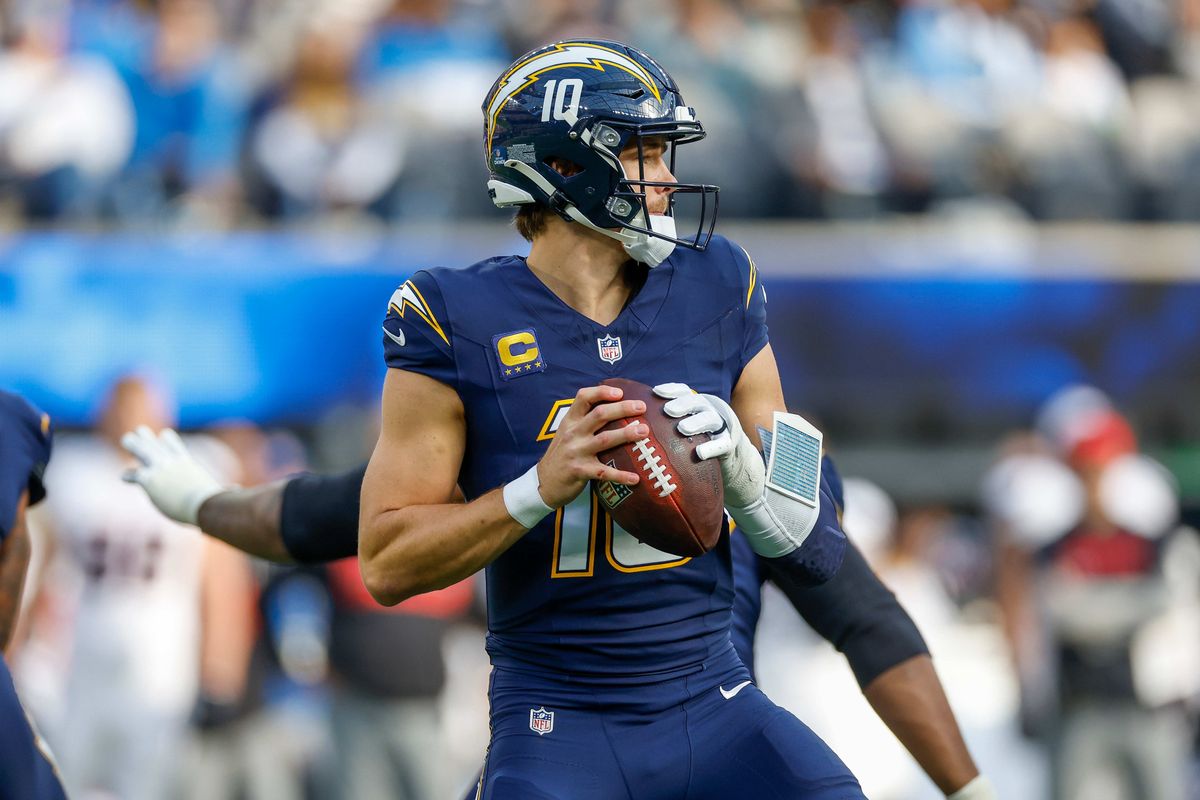 Los Angeles Chargers quarterback Justin Herbert (10) runs the ball for a gain during a NFL game against the Houston Texans on December 027, 2025 at Sofi Stadium in Inglewood, CA. Los Angeles Chargers quarterback Justin Herbert (10) runs the ball for a gain during a NFL game against the Houston Texans on December 027, 2025 at Sofi Stadium in Inglewood, CA.