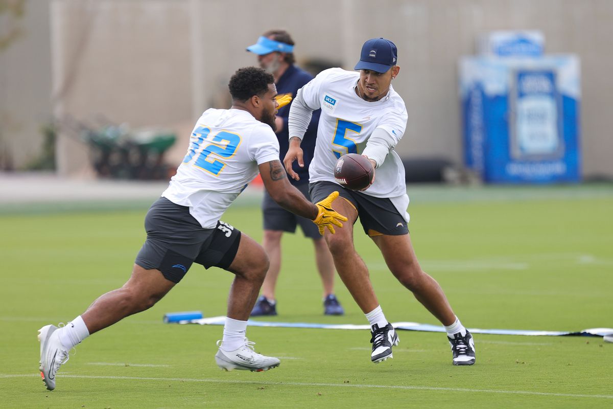 Los Angeles Chargers quarterback Trey Lance (5) hands off to running back Jaret Patterson (32) during Chargers organized team activities on May 11th, 2026 in El Segundo, CA. Los Angeles Chargers quarterback Trey Lance (5) hands off to running back Jaret Patterson (32) during Chargers organized team activities on May 11th, 2026 in El Segundo, CA.