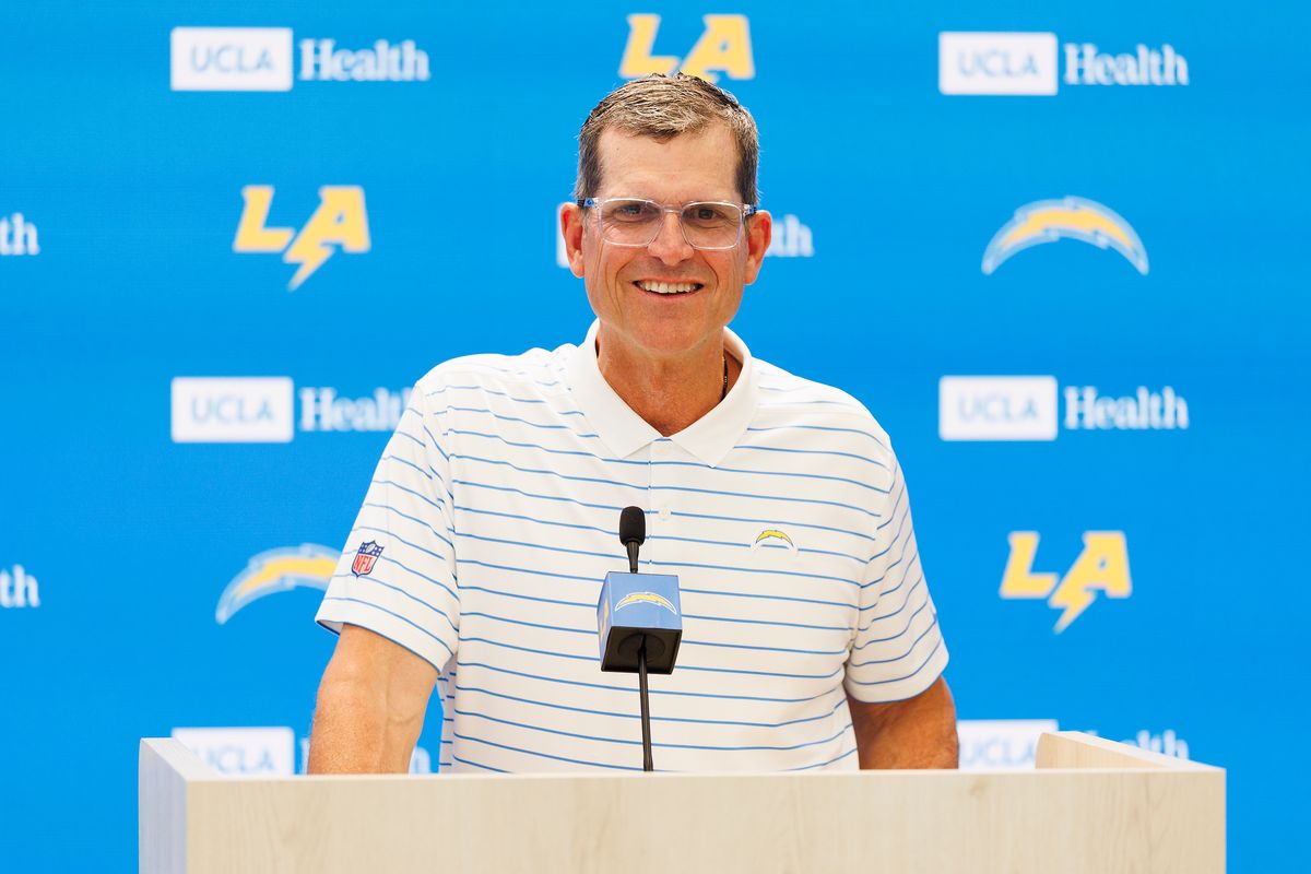 Jim Harbaugh of the Los Angeles Chargers speaks with members of the media before mandatory minicamp at The Bolt on June 16, 2026 in El Segundo, California. Jim Harbaugh of the Los Angeles Chargers speaks with members of the media before mandatory minicamp at The Bolt on June 16, 2026 in El Segundo, California.