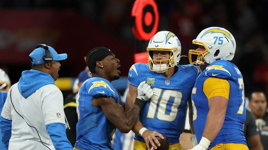 Sep 5, 2025; Sao Paulo, BRAZIL; Los Angeles Chargers quarterback Justin Herbert (10) and center Bradley Bozeman (75) celebrate after the game against the Kansas City Chiefs at Corinthians Arena.
