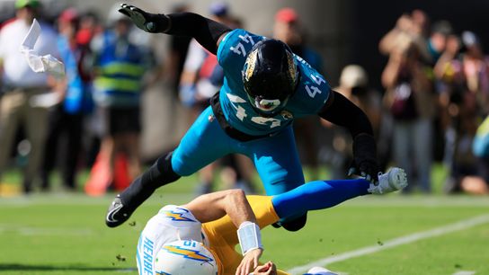 Jacksonville Jaguars defensive end Travon Walker (44) hurries Los Angeles Chargers quarterback Justin Herbert (10) as he is called for intentional grounding during the first quarter of an NFL football game at EverBank Stadium, Sunday, Nov. 16, 2025 in Jacksonville, Fla. Jacksonville Jaguars defensive end Travon Walker (44) hurries Los Angeles Chargers quarterback Justin Herbert (10) as he is called for intentional grounding during the first quarter of an NFL football game at EverBank Stadium, Sunday, Nov. 16, 2025 in Jacksonville, Fla.