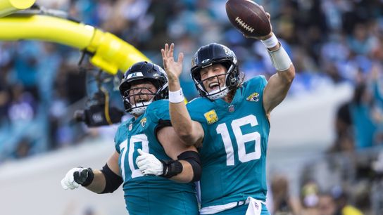 Nov 16, 2025; Jacksonville, Florida, USA; Jacksonville Jaguars quarterback Trevor Lawrence (16) celebrates with offensive tackle Cole Van Lanen (70) after rushing for a touchdown against the Los Angeles Chargers during the third quarter at EverBank Stadium. Nov 16, 2025; Jacksonville, Florida, USA; Jacksonville Jaguars quarterback Trevor Lawrence (16) celebrates with offensive tackle Cole Van Lanen (70) after rushing for a touchdown against the Los Angeles Chargers during the third quarter at EverBank Stadium.