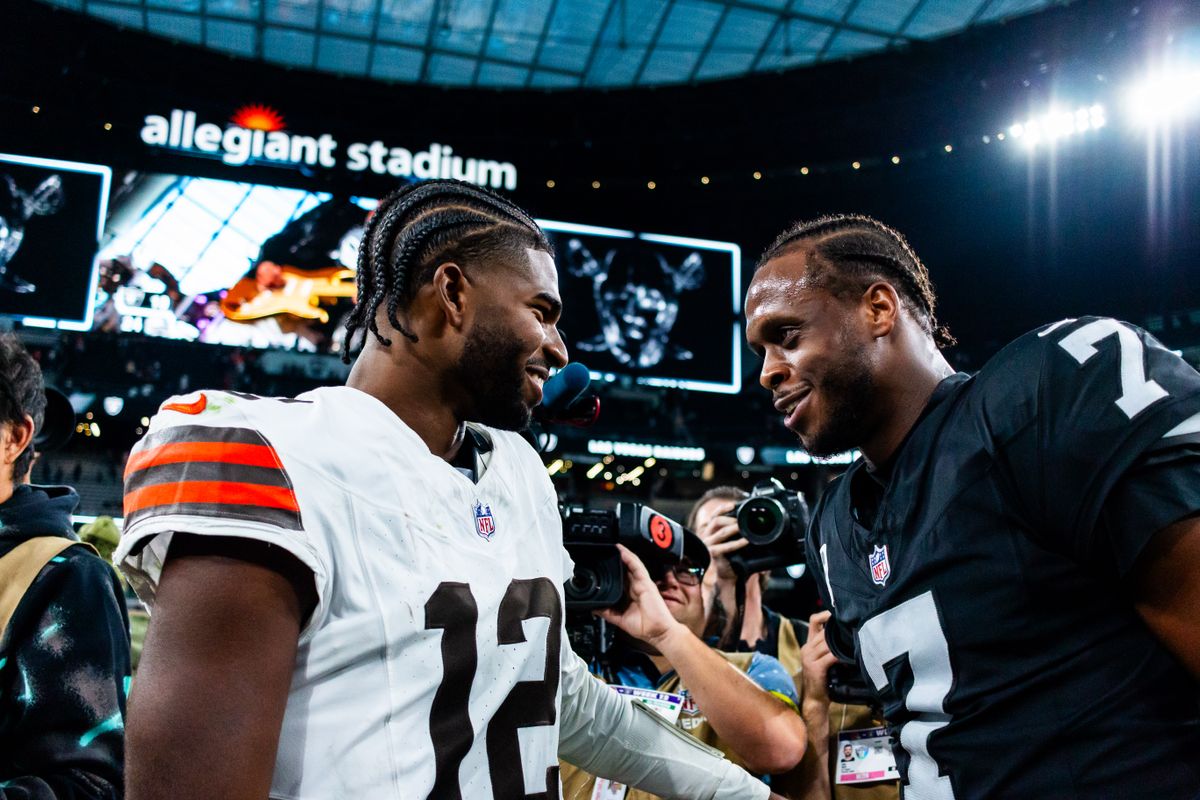 Cleveland Browns quarterback Shadeur Sanders (12) and Las Vegas Raiders quarterback Geno Smith (7) speak to one another after a NFL game between the Las Vegas Raiders and the Cleveland Browns, Sunday November 23, 2025 in Las Vegas, Nev. Cleveland Browns quarterback Shadeur Sanders (12) and Las Vegas Raiders quarterback Geno Smith (7) speak to one another after a NFL game between the Las Vegas Raiders and the Cleveland Browns, Sunday November 23, 2025 in Las Vegas, Nev.