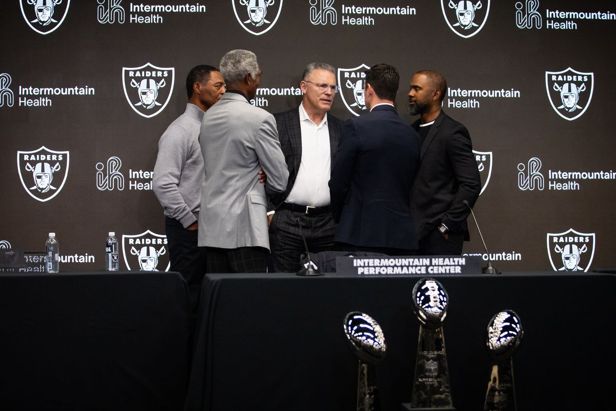 Former Las Vegas Raiders legends speak with newly hired head coach Klint Kubiak after a press conference, Tuesday February 10, 2026 in Henderson, Nev. Former Las Vegas Raiders legends speak with newly hired head coach Klint Kubiak after a press conference, Tuesday February 10, 2026 in Henderson, Nev.