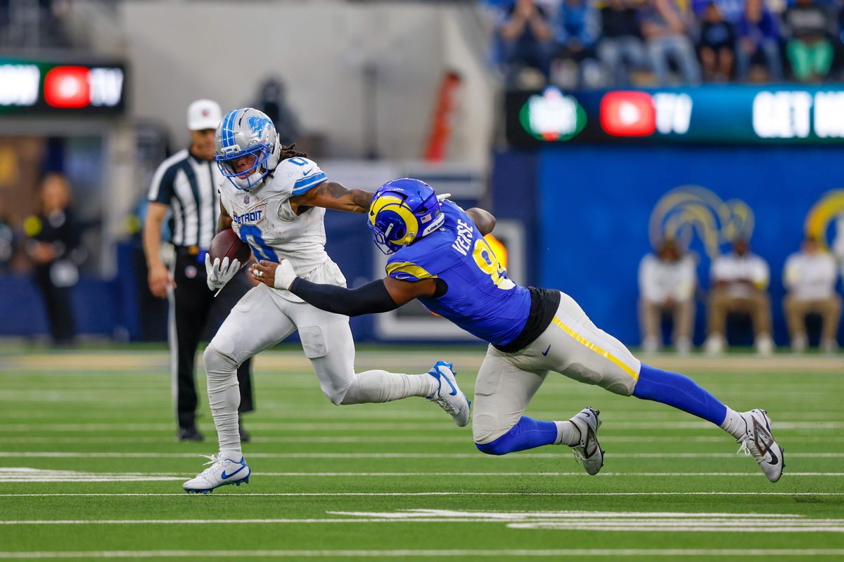 Detroit Lions running back Jahmyr Gibbs (0) runs the ball and get tackled by Los Angeles Rams linebacker Jared Verse (8) during a NFL game against the Detroit Lions on December 15, 2025 at Sofi Stadium in Inglewood, CA. Detroit Lions running back Jahmyr Gibbs (0) runs the ball and get tackled by Los Angeles Rams linebacker Jared Verse (8) during a NFL game against the Detroit Lions on December 15, 2025 at Sofi Stadium in Inglewood, CA.