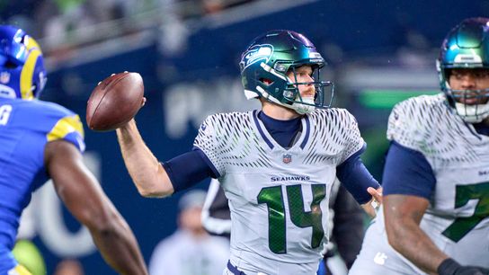 Seattle Seahawks quarterback Sam Darnold (14) throws the football during an NFL football game against the Los Angeles Rams, on Thursday December 18, 2025 in Seattle, Washington.