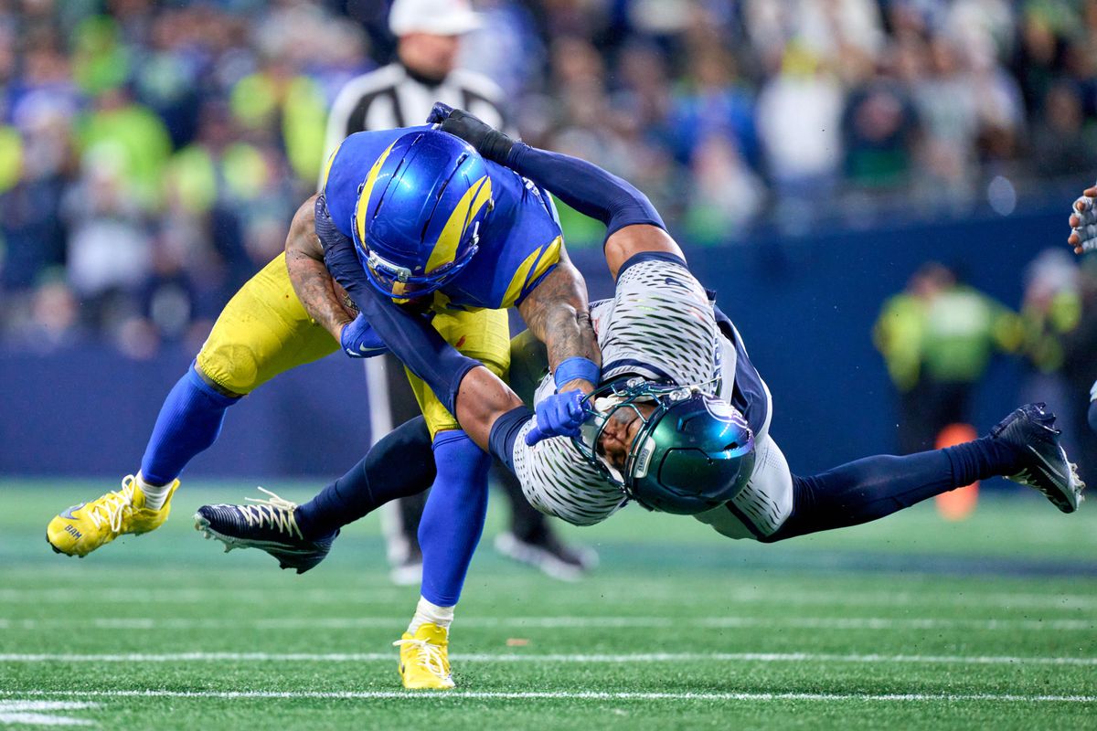 Los Angeles Rams running back Kyren Williams (23) battles with Seattle Seahawks safety Nick Emmanwori (3) during an NFL football game against the Seattle Seahawks, on Thursday December 18, 2025 in Seattle, Washington. Los Angeles Rams running back Kyren Williams (23) battles with Seattle Seahawks safety Nick Emmanwori (3) during an NFL football game against the Seattle Seahawks, on Thursday December 18, 2025 in Seattle, Washington.