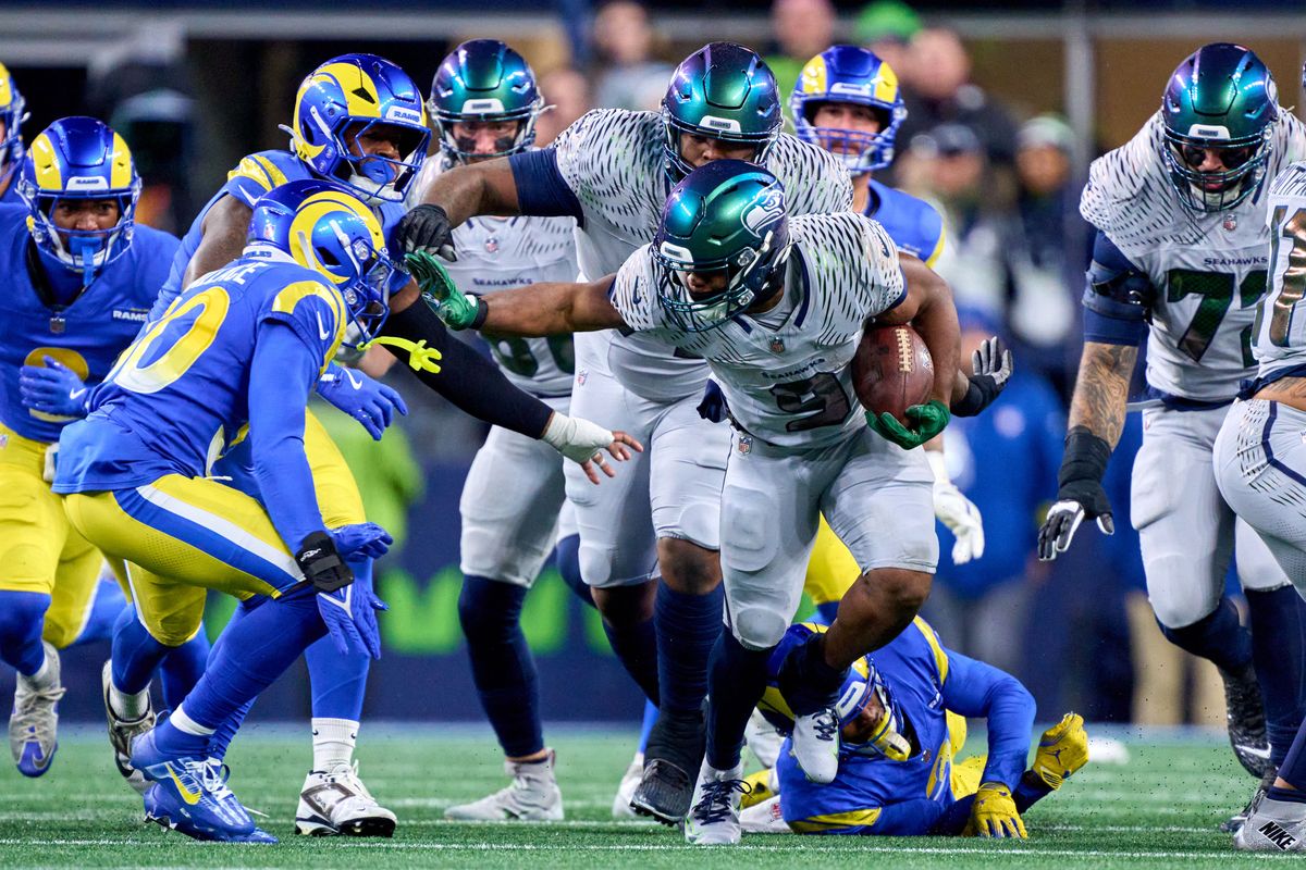 Seattle Seahawks running back Kenneth Walker III (9) runs with the football during an NFL football game against the Los Angeles Rams, on Thursday December 18, 2025 in Seattle, Washington. Seattle Seahawks running back Kenneth Walker III (9) runs with the football during an NFL football game against the Los Angeles Rams, on Thursday December 18, 2025 in Seattle, Washington.