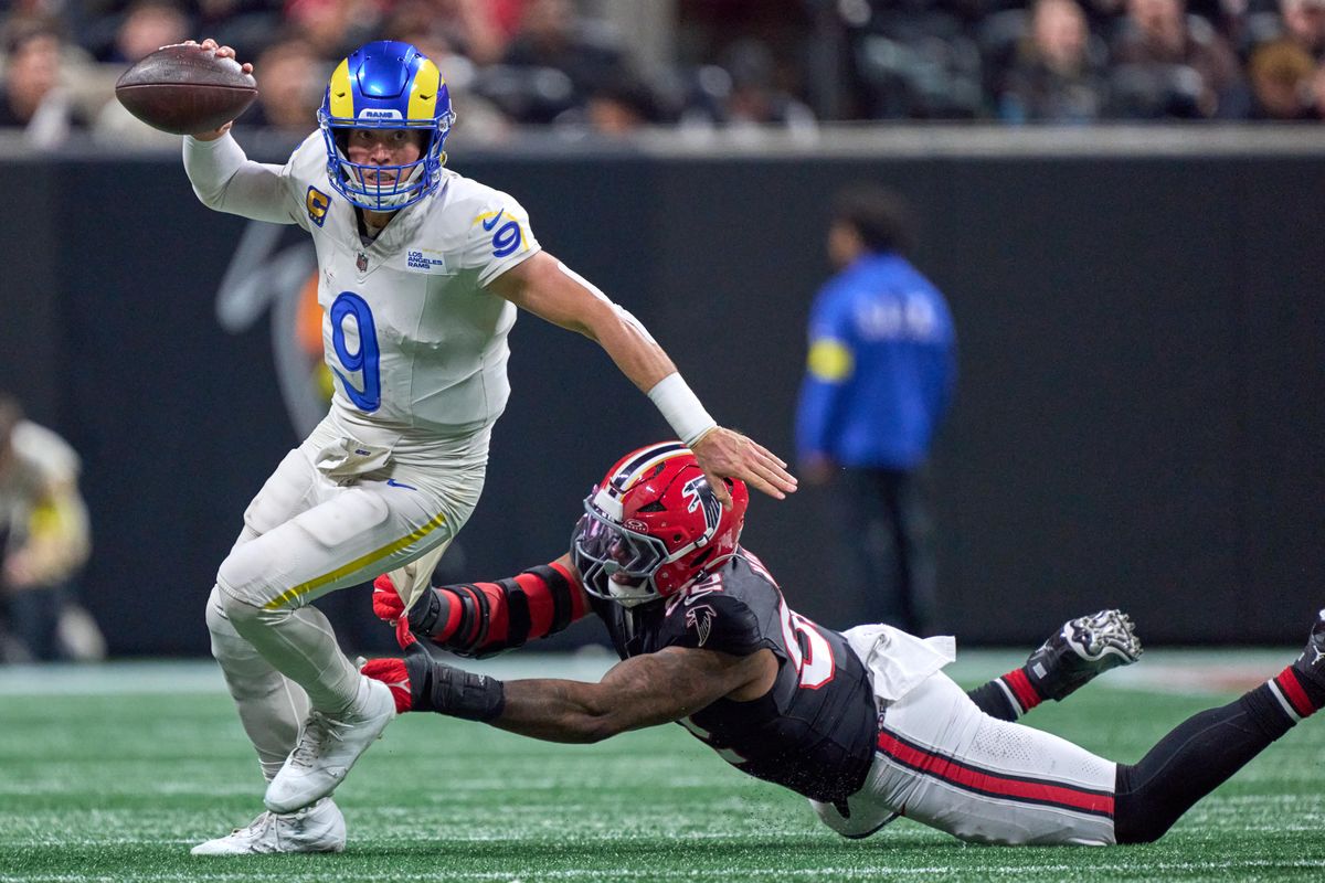 Los Angeles Rams quarterback Matthew Stafford (9) battles with Atlanta Falcons linebacker Khalid Kareem (92) during an NFL football game against the Atlanta Falcons, on Monday, December 29, 2025 in Atlanta, Geor. Los Angeles Rams quarterback Matthew Stafford (9) battles with Atlanta Falcons linebacker Khalid Kareem (92) during an NFL football game against the Atlanta Falcons, on Monday, December 29, 2025 in Atlanta, Geor.