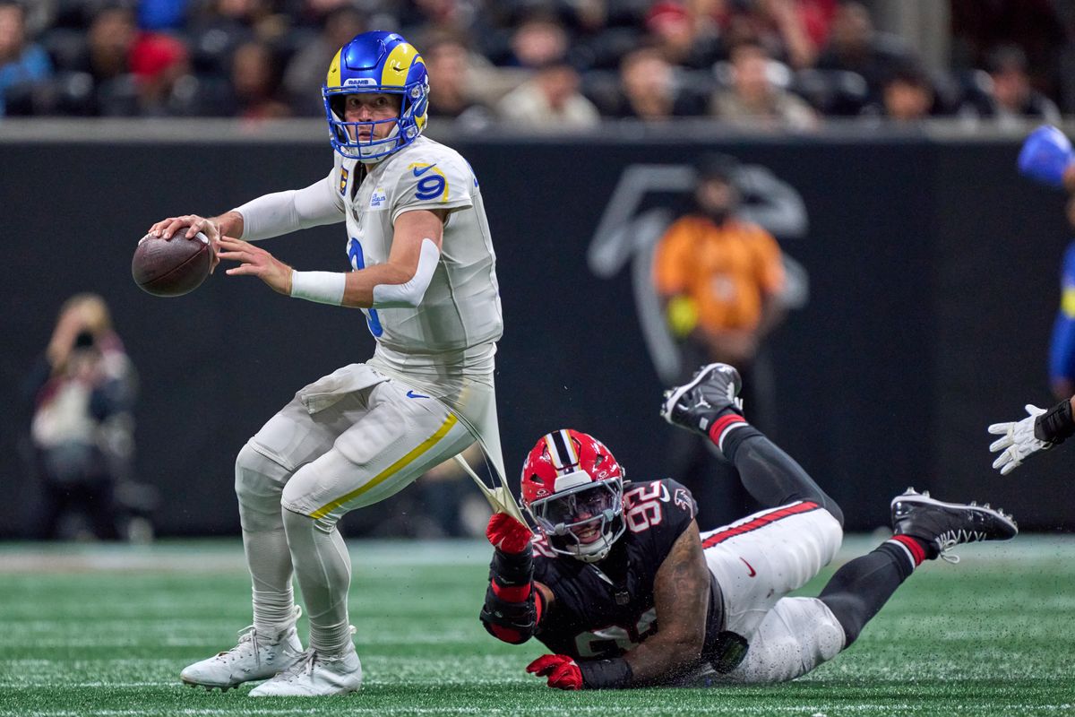 Los Angeles Rams quarterback Matthew Stafford (9) battles with Atlanta Falcons linebacker Khalid Kareem (92) during an NFL football game against the Atlanta Falcons, on Monday, December 29, 2025 in Atlanta, Geor. Los Angeles Rams quarterback Matthew Stafford (9) battles with Atlanta Falcons linebacker Khalid Kareem (92) during an NFL football game against the Atlanta Falcons, on Monday, December 29, 2025 in Atlanta, Geor.