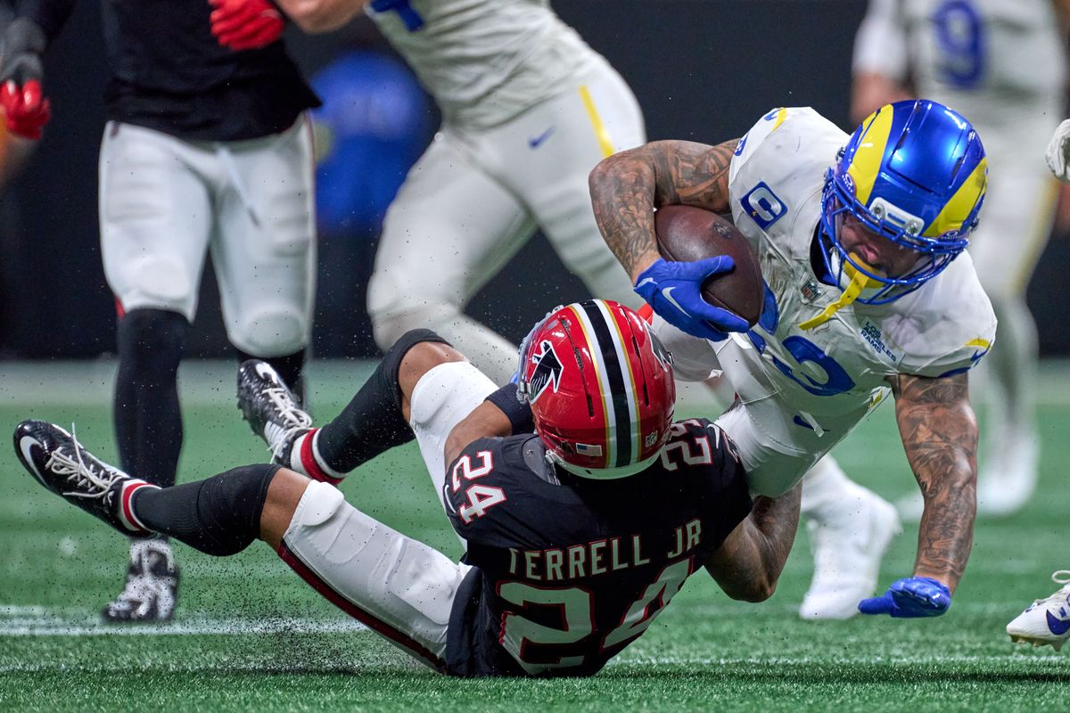 Atlanta Falcons cornerback A.J. Terrell Jr. (24) tackles Los Angeles Rams running back Kyren Williams (23) during a NFL football game against the Los Angeles Rams, on Monday, December 29, 2025 in Atlanta, Geor. Atlanta Falcons cornerback A.J. Terrell Jr. (24) tackles Los Angeles Rams running back Kyren Williams (23) during a NFL football game against the Los Angeles Rams, on Monday, December 29, 2025 in Atlanta, Geor.