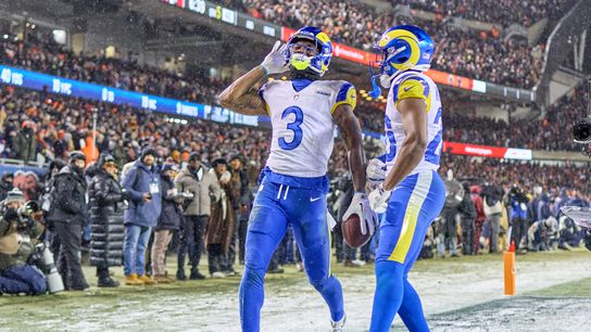 Los Angeles Rams safety Kam Curl #3 celebrates with teammates after making an interception in the fourth quarter during a NFL Divisional football game against the Chicago Bears, on Sunday, January 18, 2026 in Chicago, Illinois.  