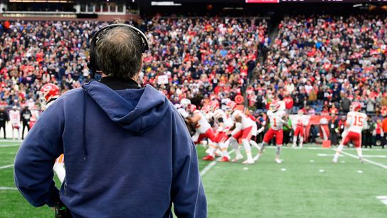 New England Patriots head coach Bill Belichick the field from the sideline during the first half against the Kansas City Chiefs at Gillette Stadium. 