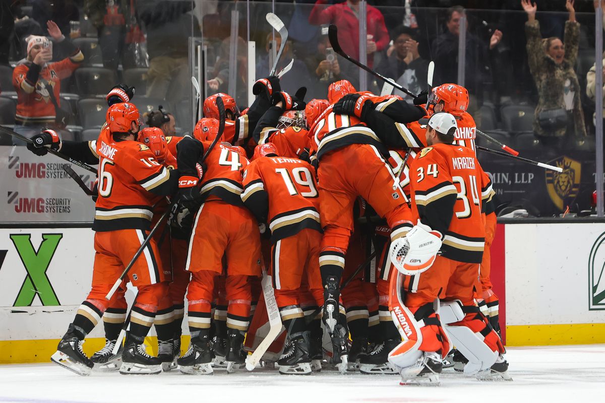 Anaheim Ducks players celebrate a game winning goal in overtime during an NHL game against the Utah Mammoth on November 17, 2025 in Anaheim, Calif. Anaheim Ducks players celebrate a game winning goal in overtime during an NHL game against the Utah Mammoth on November 17, 2025 in Anaheim, Calif.