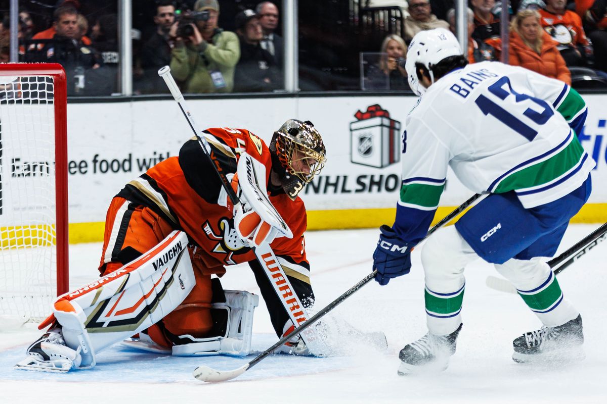 Anaheim Ducks goalie Petr Mrazek (34) blocks the puck during an NHL game against the Vancouver Canucks on November 26, 2025 in Anaheim, Calif. Anaheim Ducks goalie Petr Mrazek (34) blocks the puck during an NHL game against the Vancouver Canucks on November 26, 2025 in Anaheim, Calif.