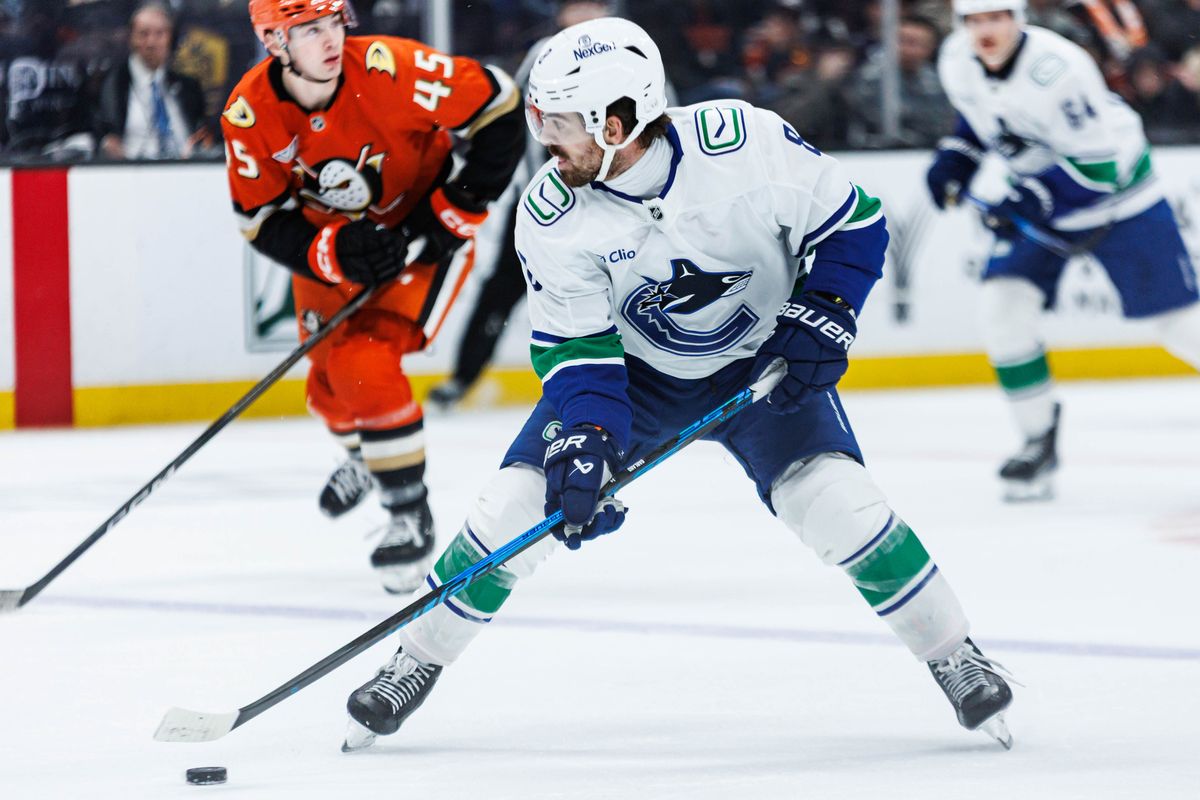 Vancouver Canucks right wing Conor Garland (8) looks to pass the puck during an NHL game against the Anaheim Ducks on November 26, 2025 in Anaheim, Calif. Vancouver Canucks right wing Conor Garland (8) looks to pass the puck during an NHL game against the Anaheim Ducks on November 26, 2025 in Anaheim, Calif.