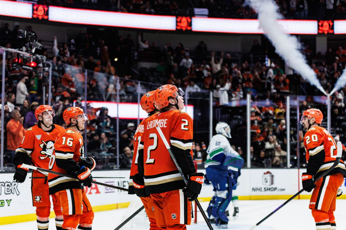 Anaheim Ducks defense Jackson LaCombe (2) looks up at the scoreboard after scoring a goal during an NHL game against the Vancouver Canucks on November 26, 2025 in Anaheim, Calif. Anaheim Ducks defense Jackson LaCombe (2) looks up at the scoreboard after scoring a goal during an NHL game against the Vancouver Canucks on November 26, 2025 in Anaheim, Calif.