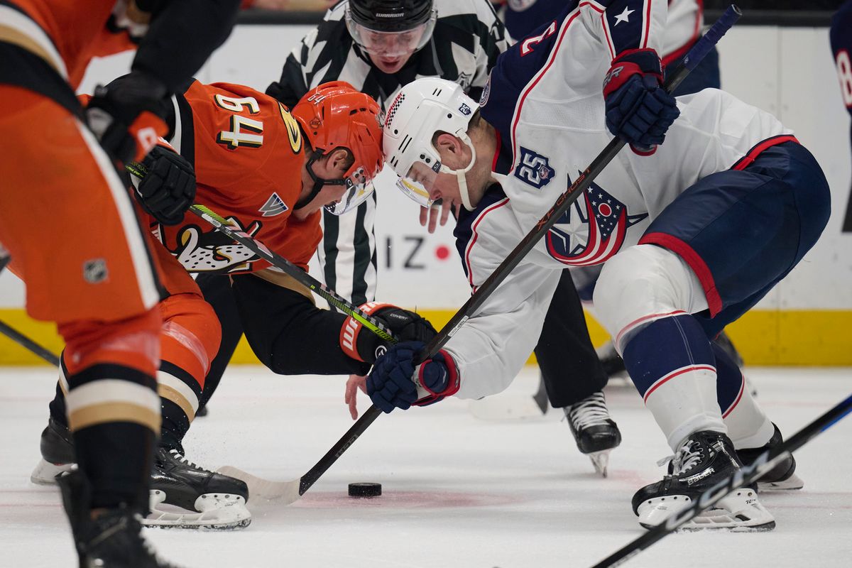 Mikael Granlund #64 of the Anaheim Ducks does a face off against the Blue Jackets at the Honda Center on December 20,2025 in Anaheim, California. Mikael Granlund #64 of the Anaheim Ducks does a face off against the Blue Jackets at the Honda Center on December 20,2025 in Anaheim, California.