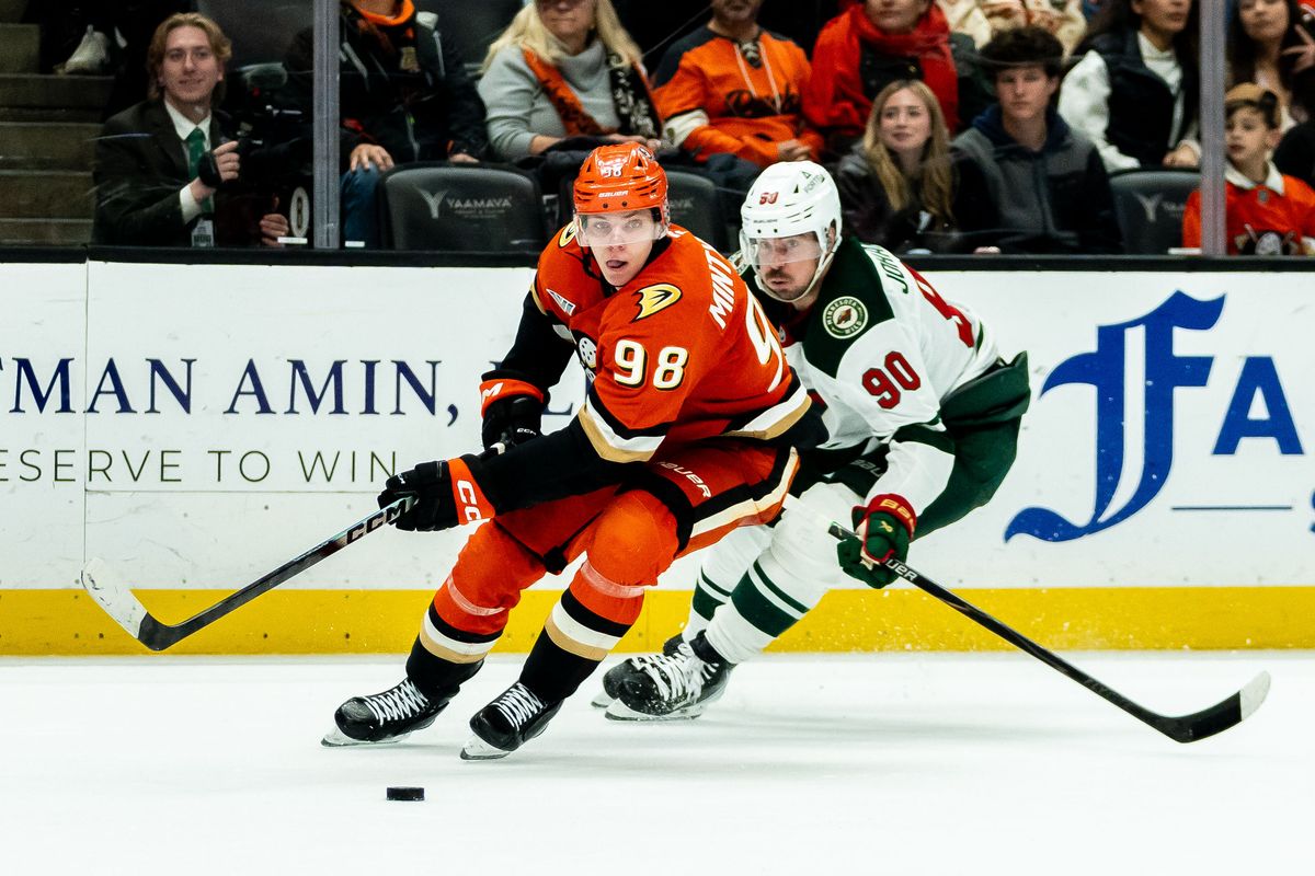 Anaheim Ducks defender Pavel Mintyukov (98) fights for possession during an NHL hockey game against the Minnesota Wild, Friday, January 2nd, 2026 in Anaheim, California Anaheim Ducks defender Pavel Mintyukov (98) fights for possession during an NHL hockey game against the Minnesota Wild, Friday, January 2nd, 2026 in Anaheim, California